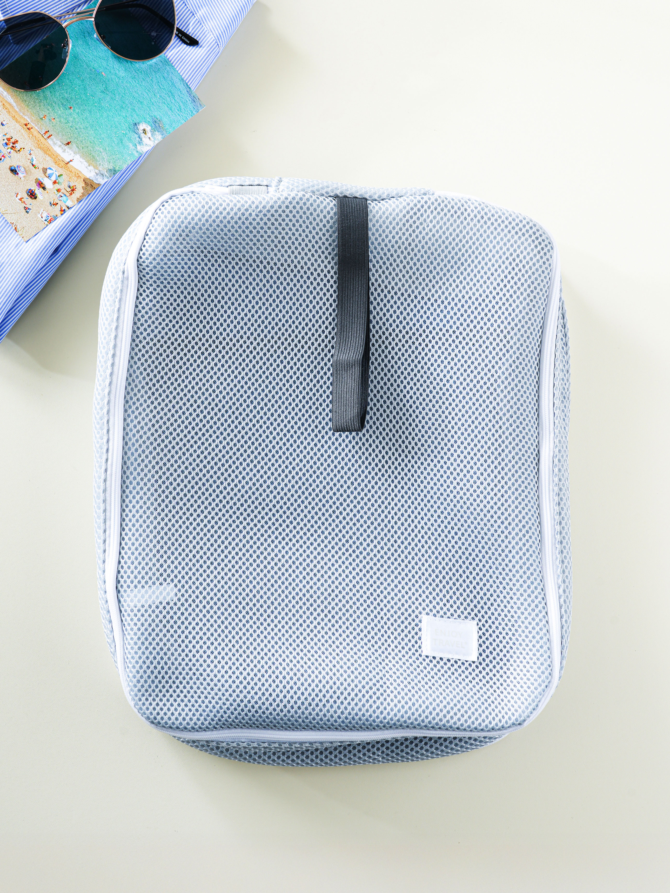Washable mesh bag with travel strap