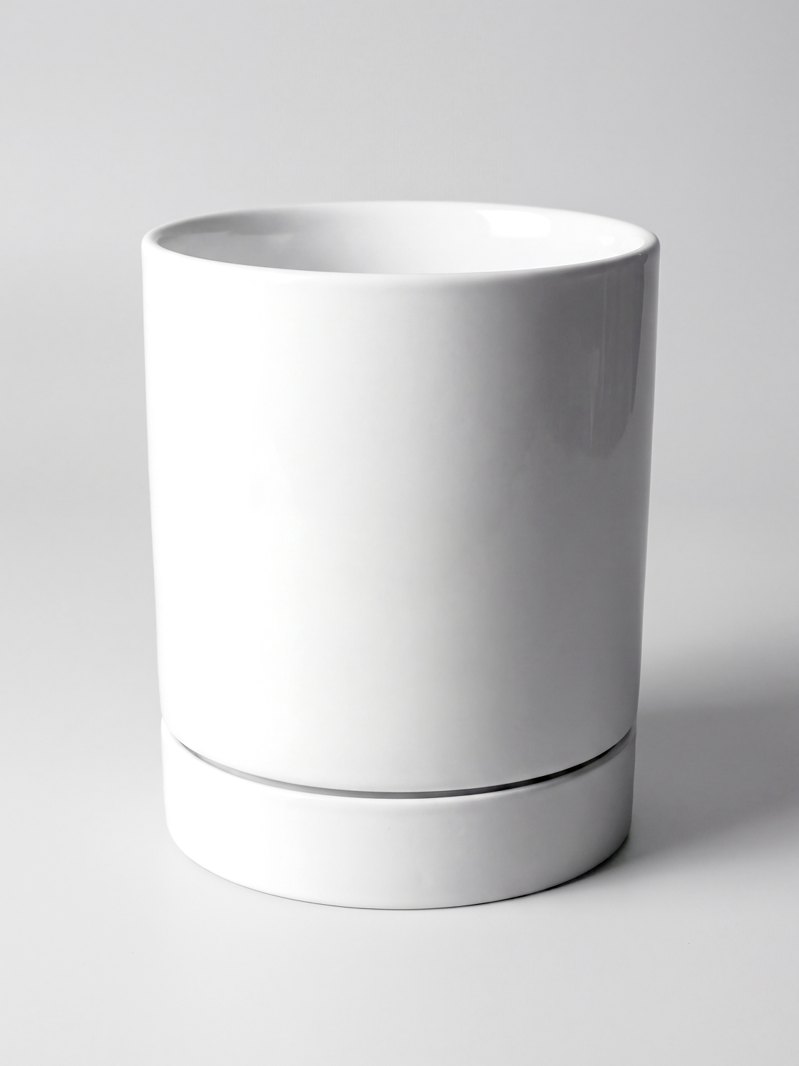 white pottery cutlery container