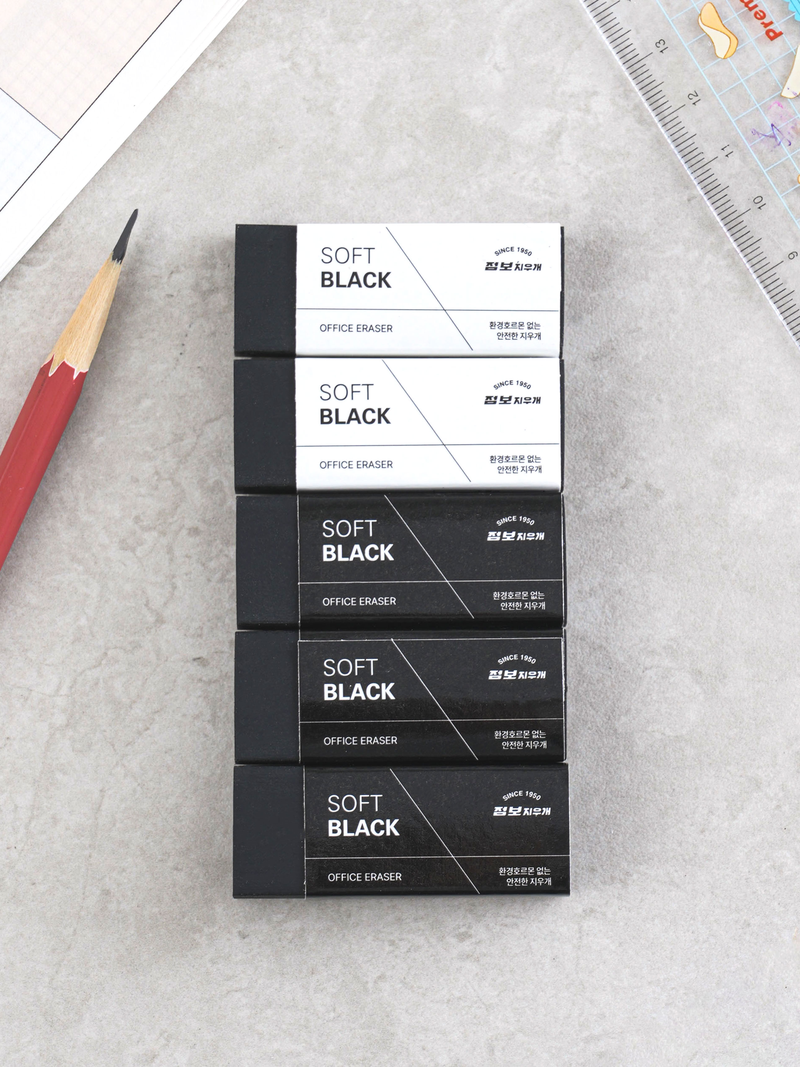 5 soft black erasers
