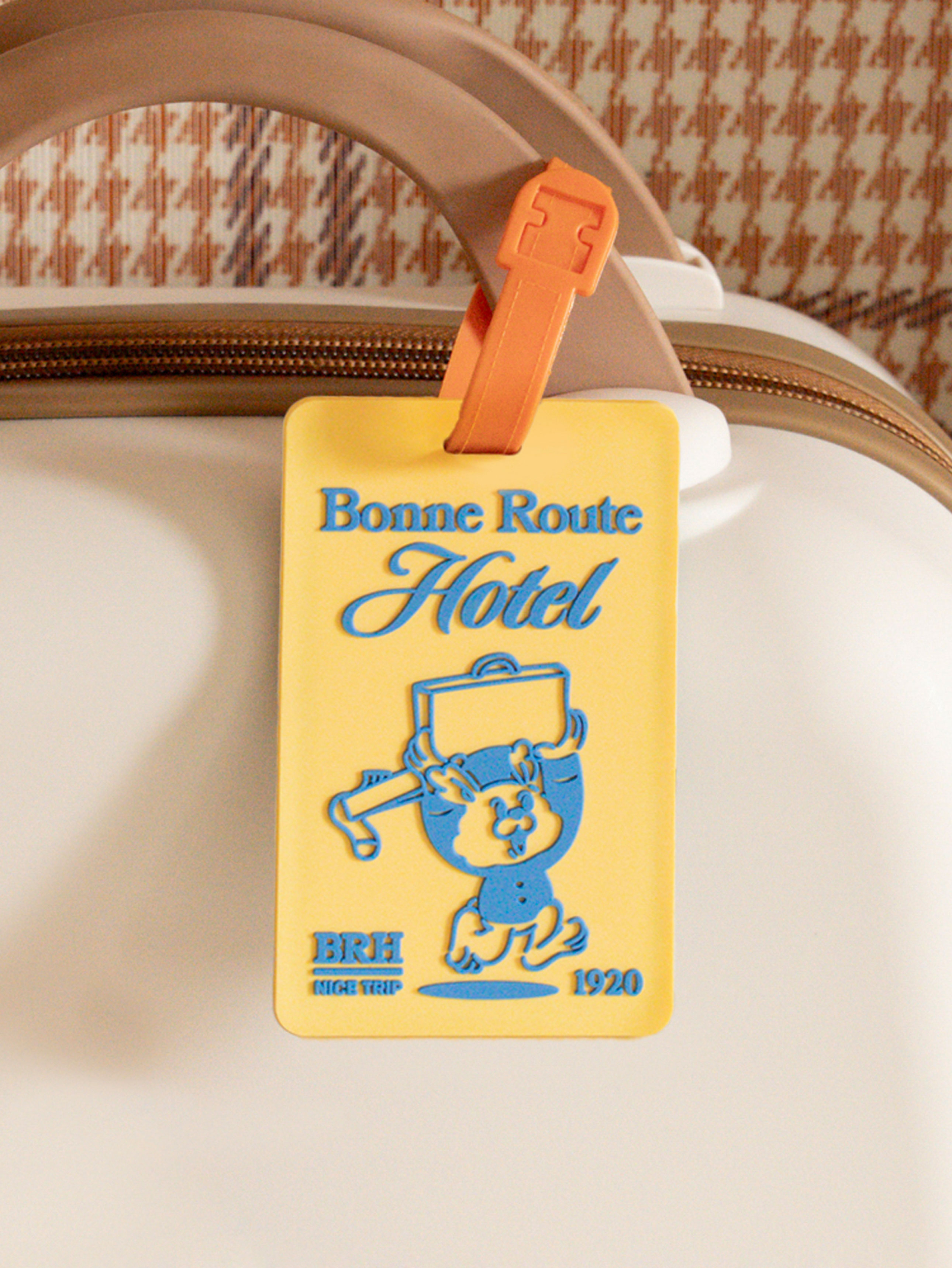 Travel character name tag yellow
