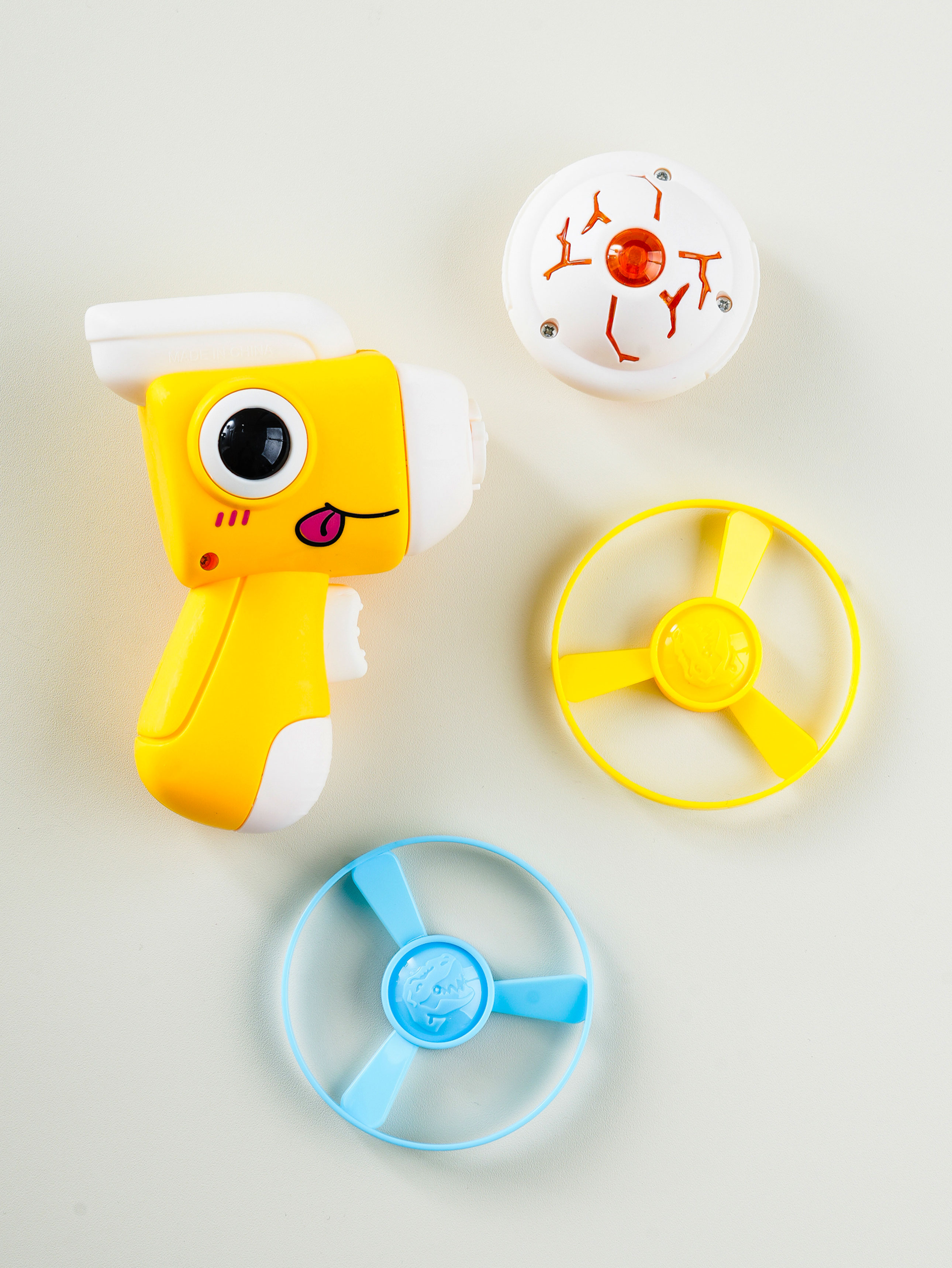 Dinosaur launch toy top & propeller