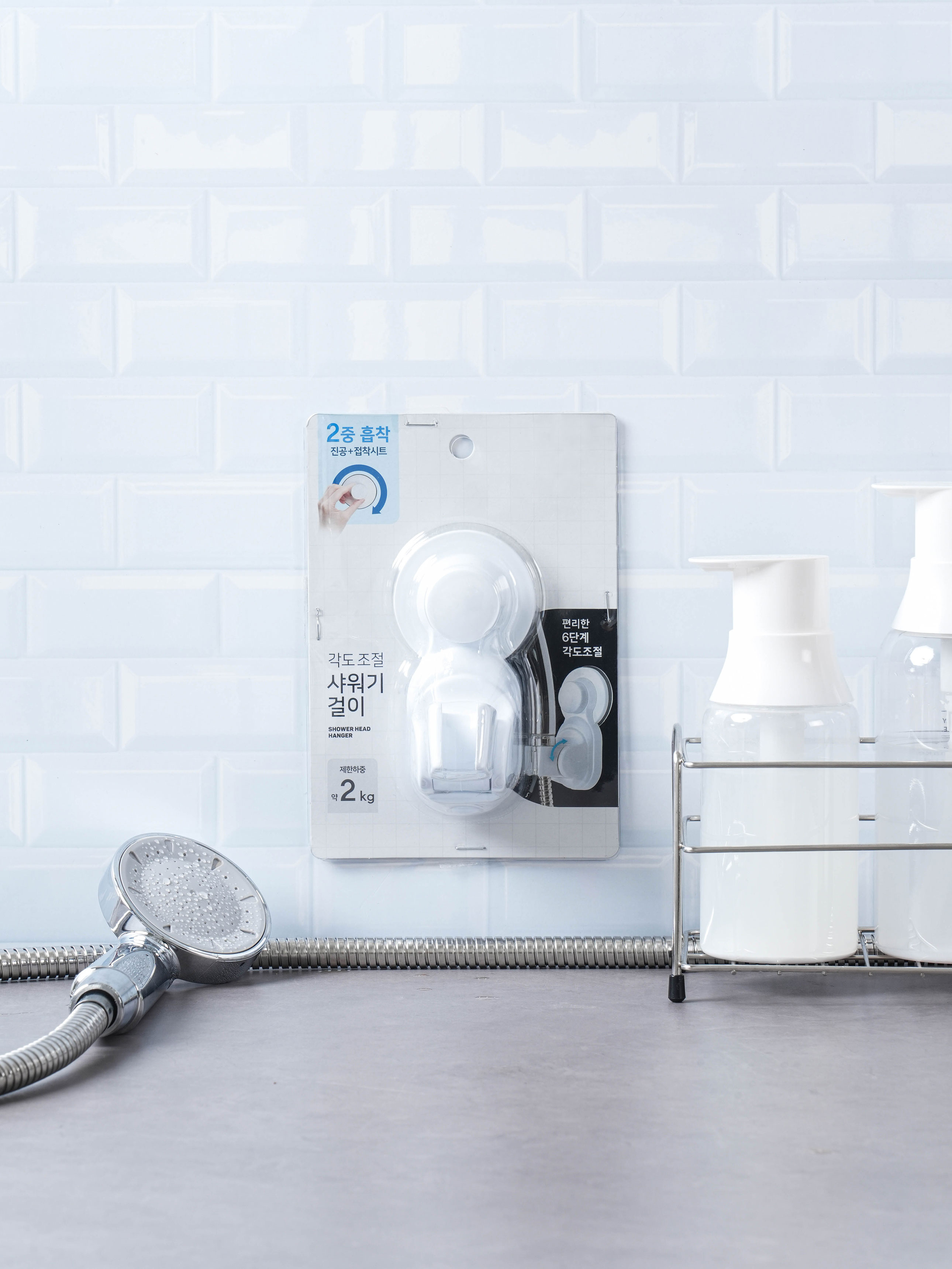 Angle adjustable suction shower hanger