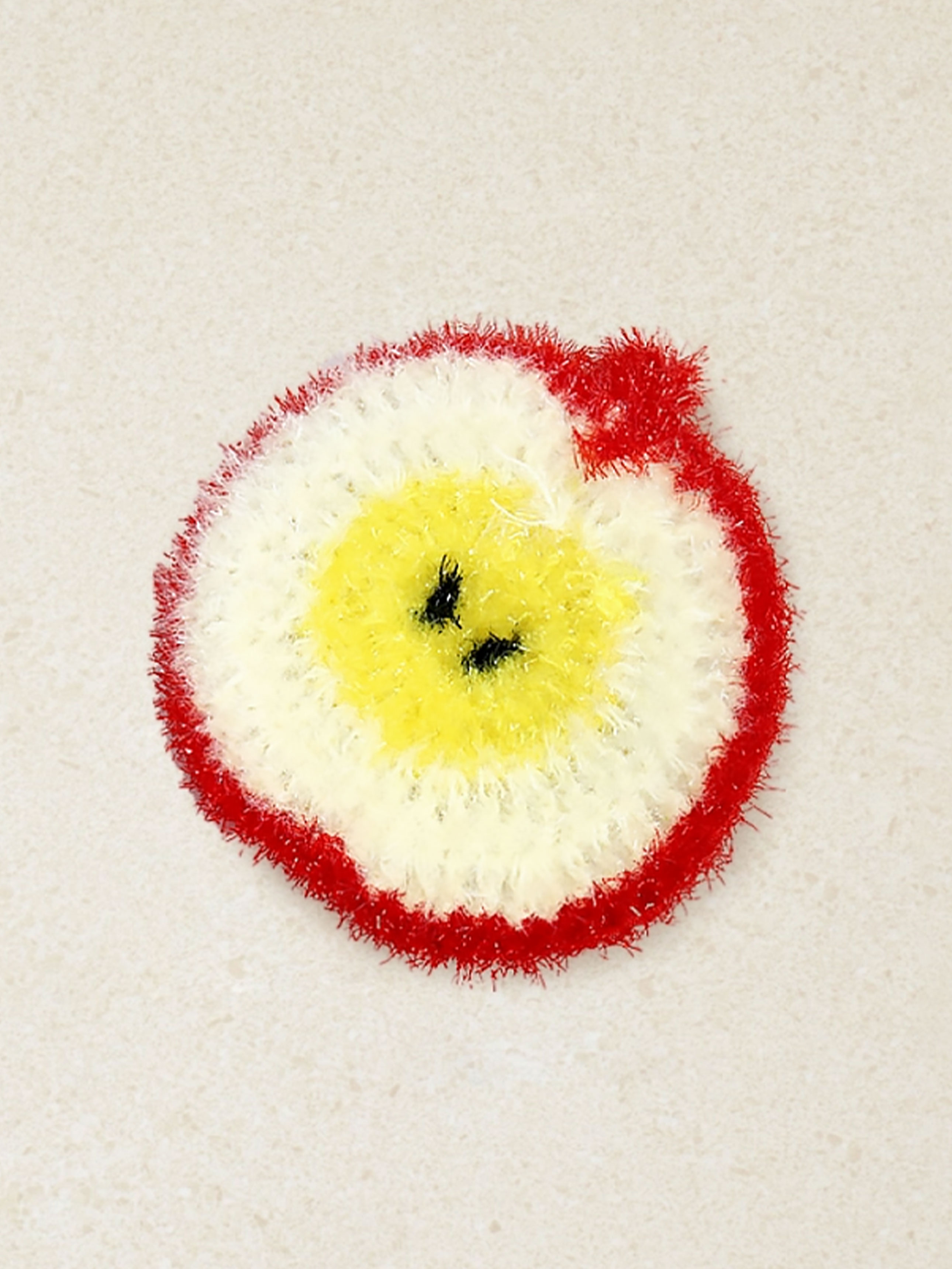 Apple-shaped hand-knitted scrubber (red)