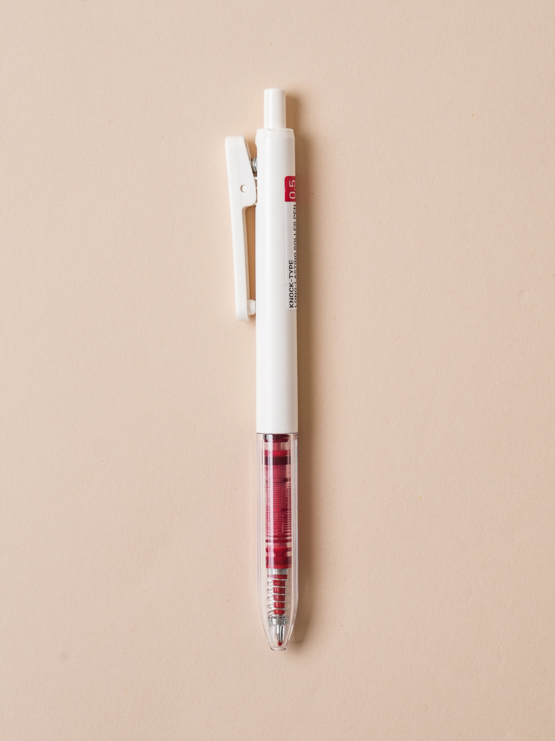 Knock type large capacity rollerball pen red
