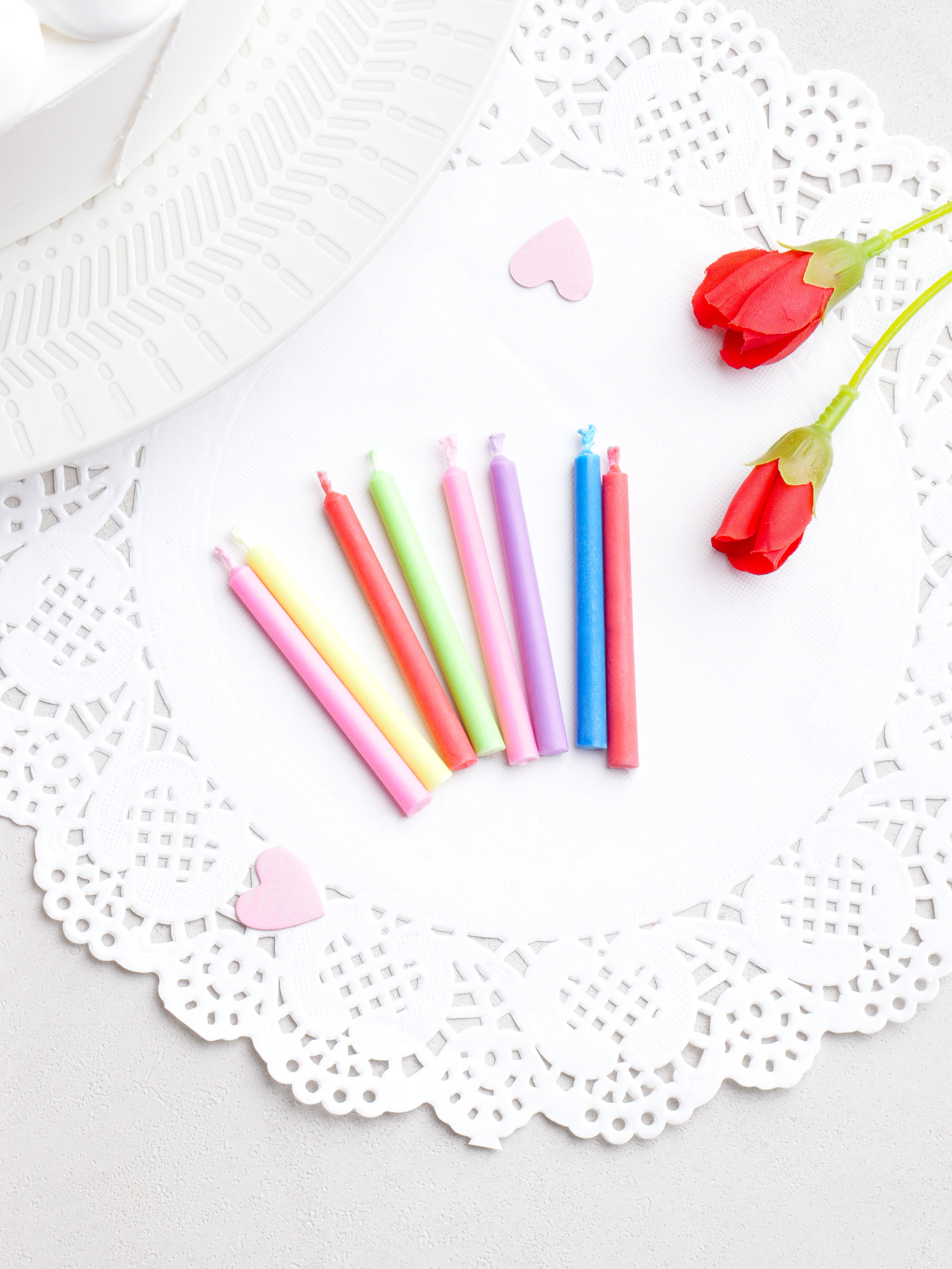 8 rainbow colored flame candles