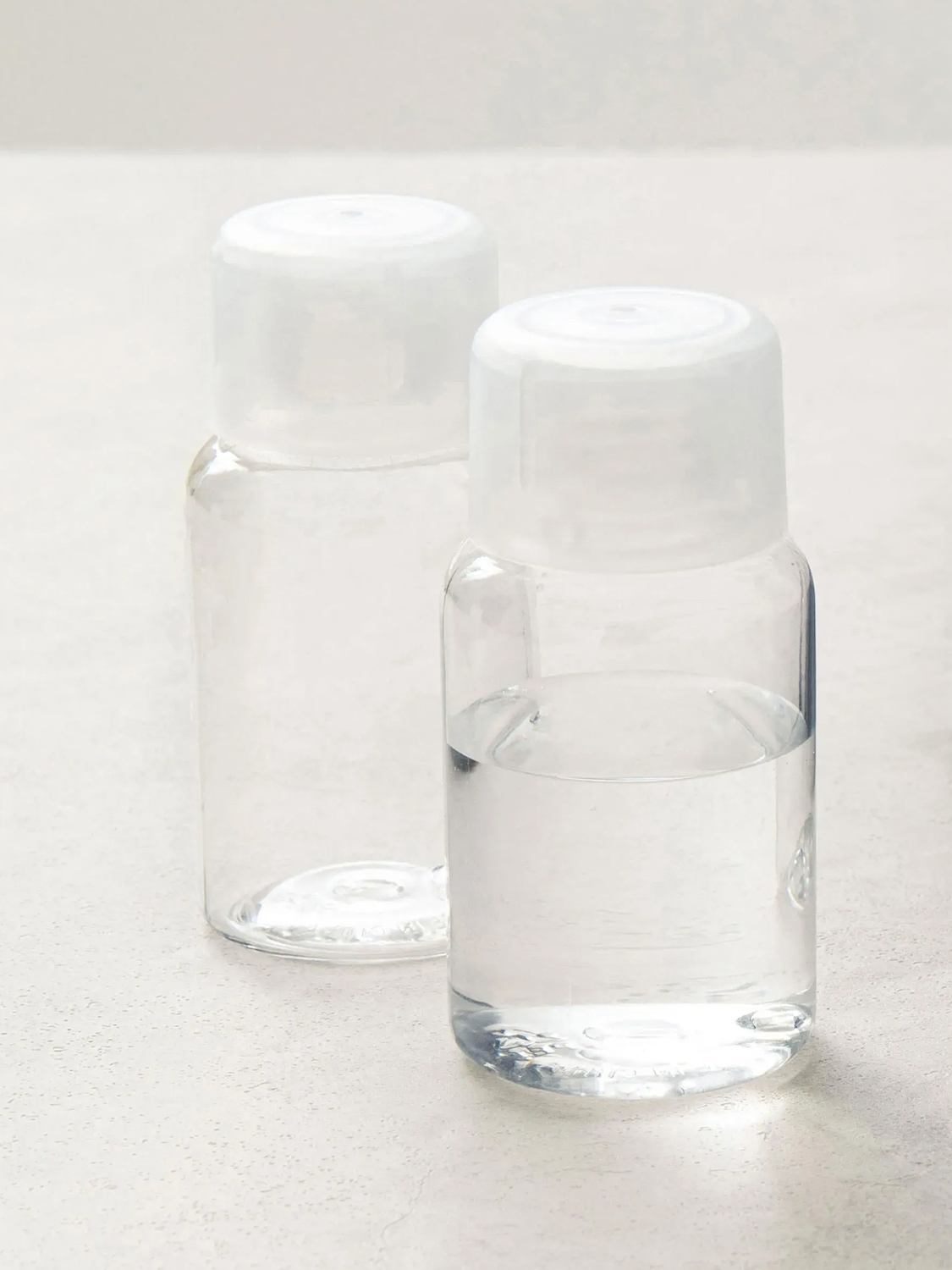 2 50ml plump lid-type refill containers