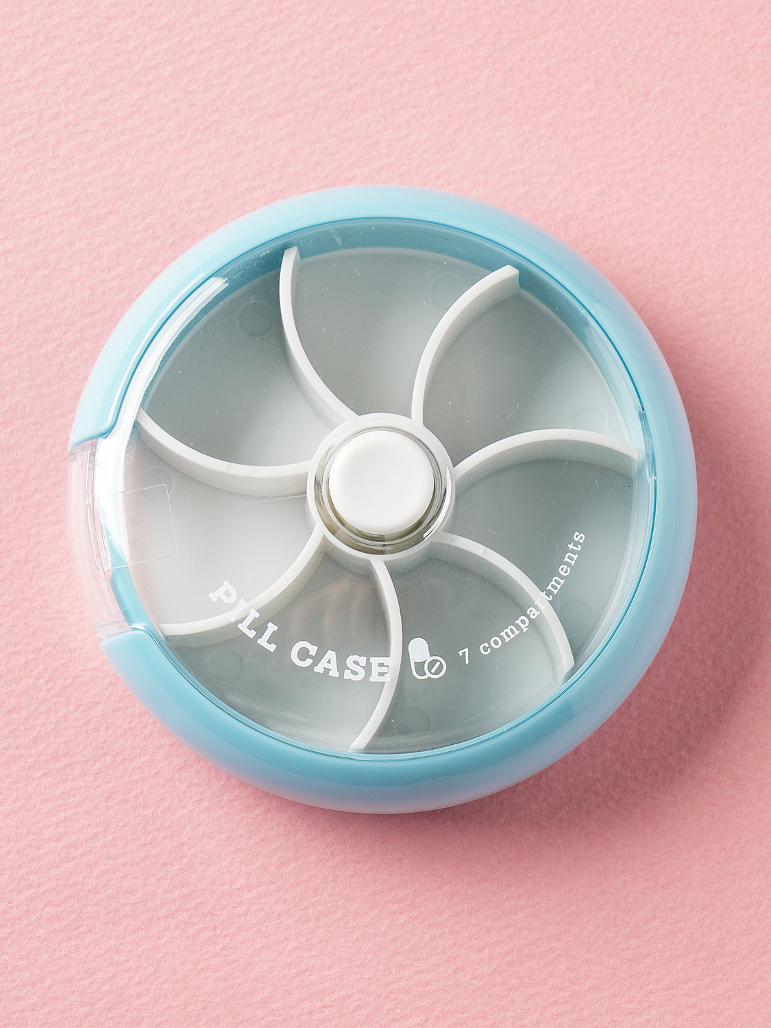 Button-type rotating 7-compartment round medicine container