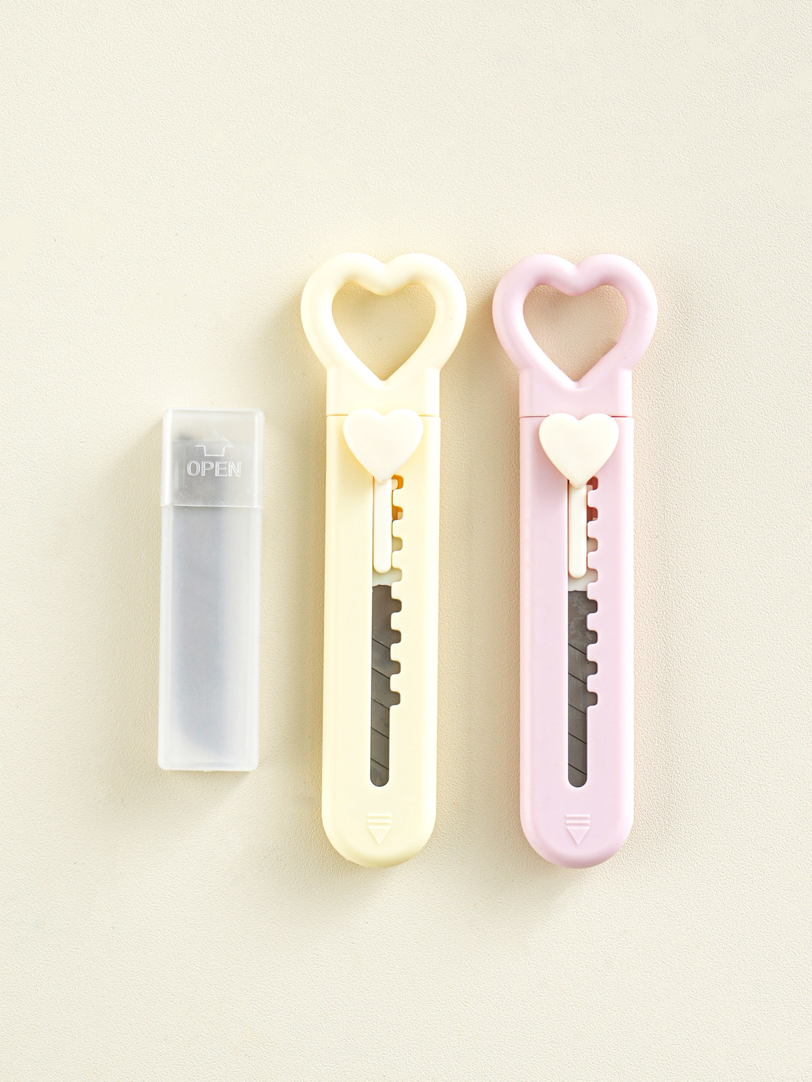 2 heart-shaped mini cutter knives
