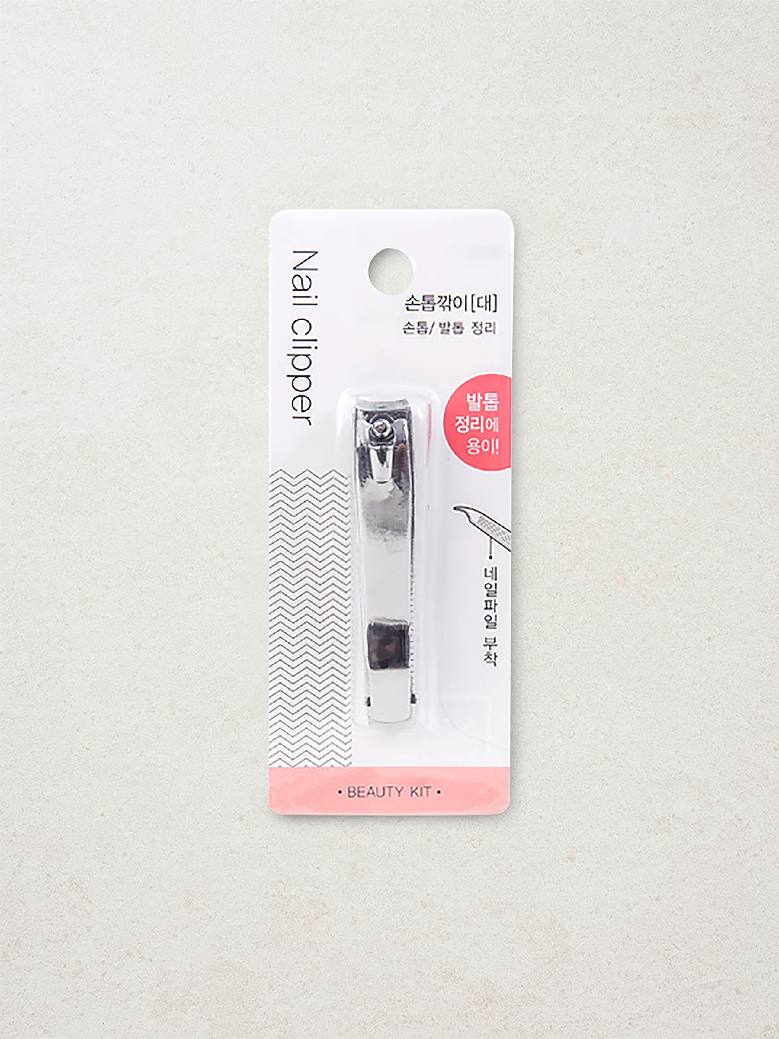 Silver nail clippers with nail file attachment