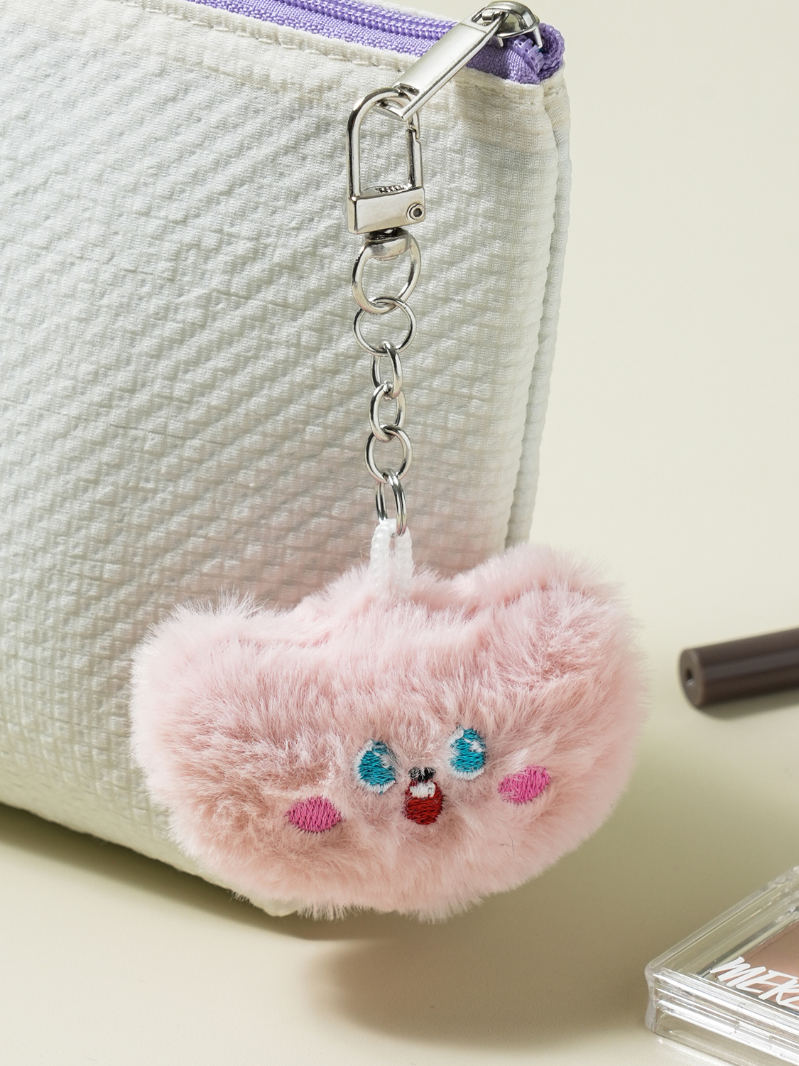 Plush keyring with expressions pink