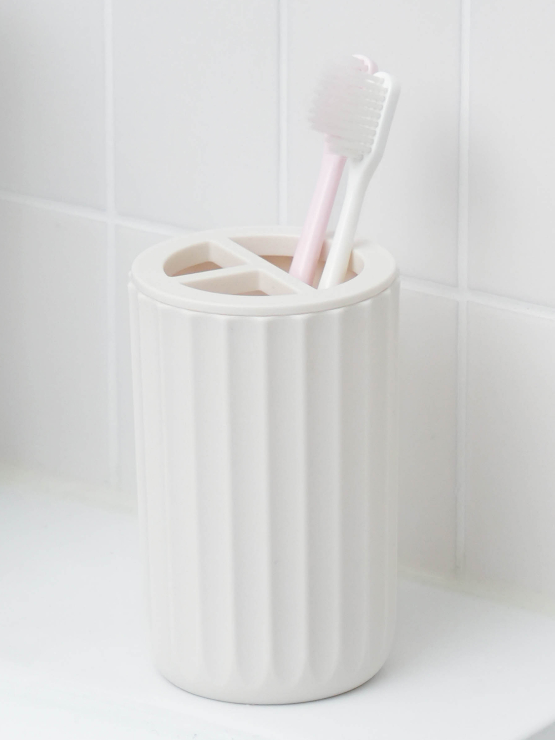 Wave cut multipurpose holder