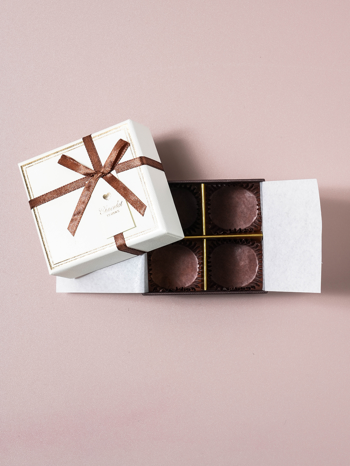 4 ribbon-shaped chocolate boxes