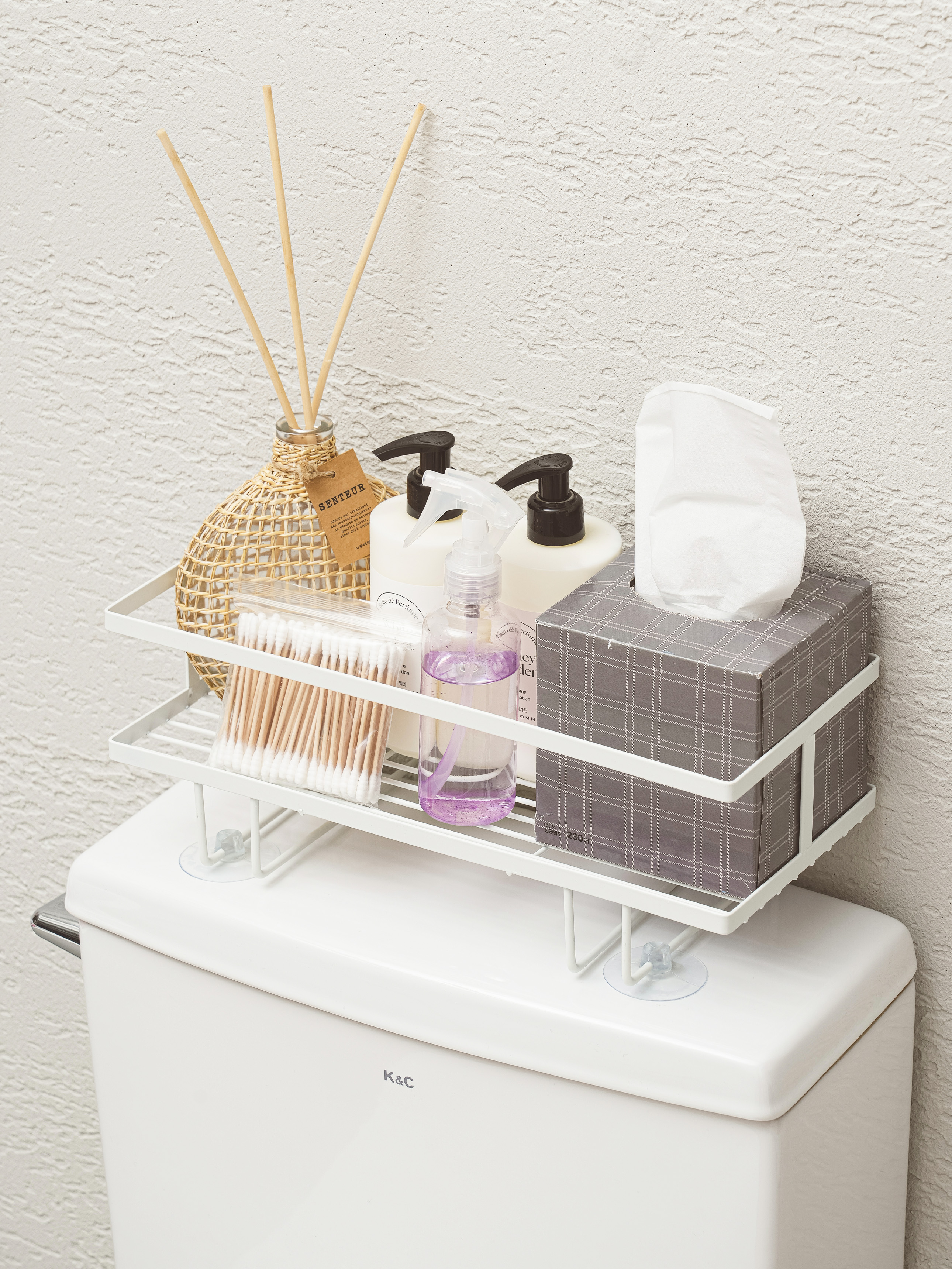 Space-efficient bathroom storage shelves
