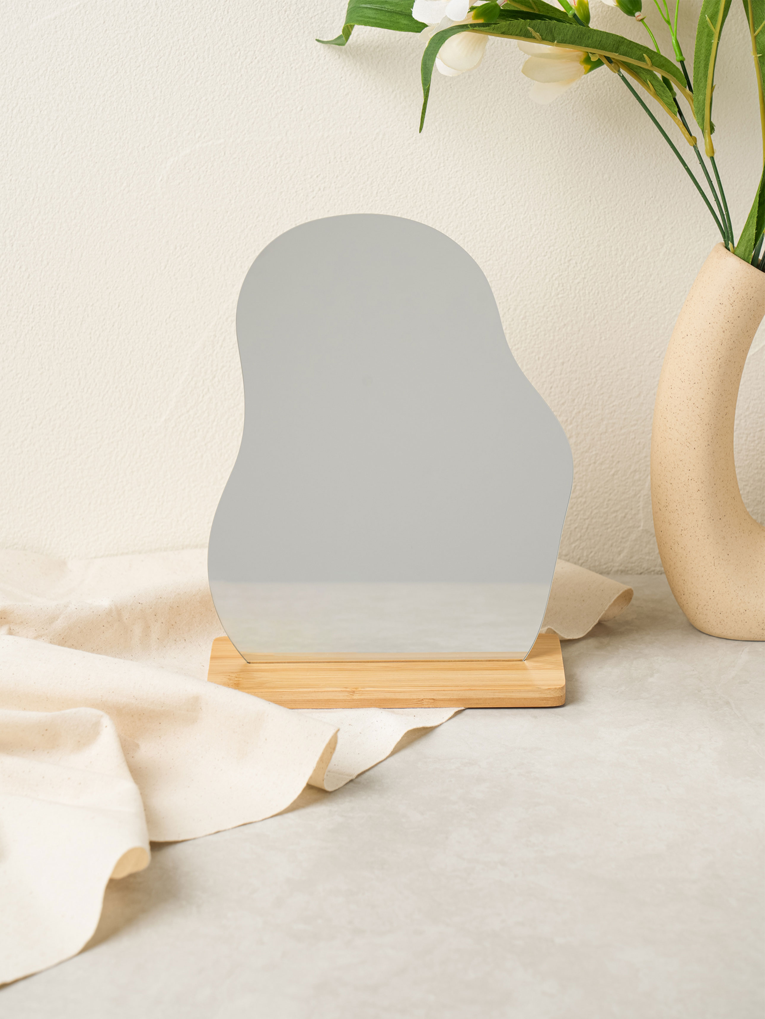 No-frame wave standing mirror