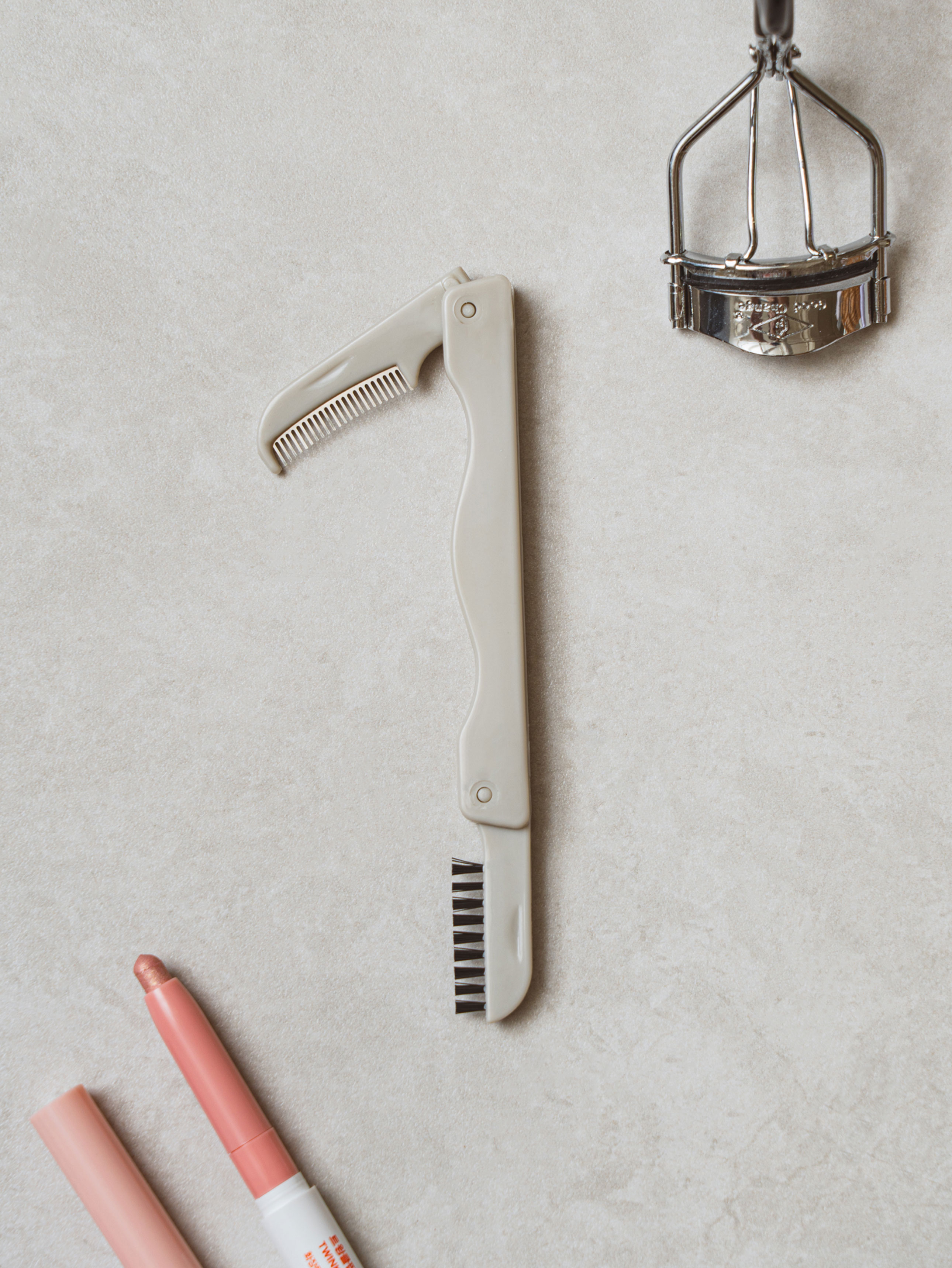 folding eyelash comb