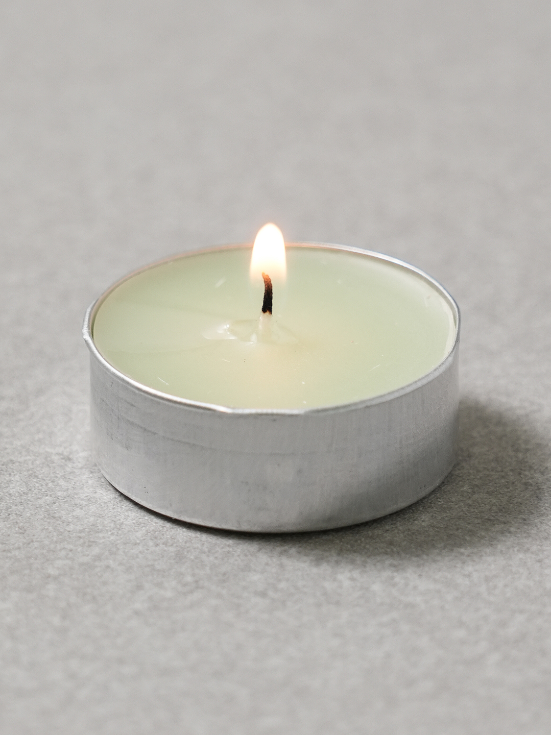 Colored tea candle verbena scent 12 g 40 packs