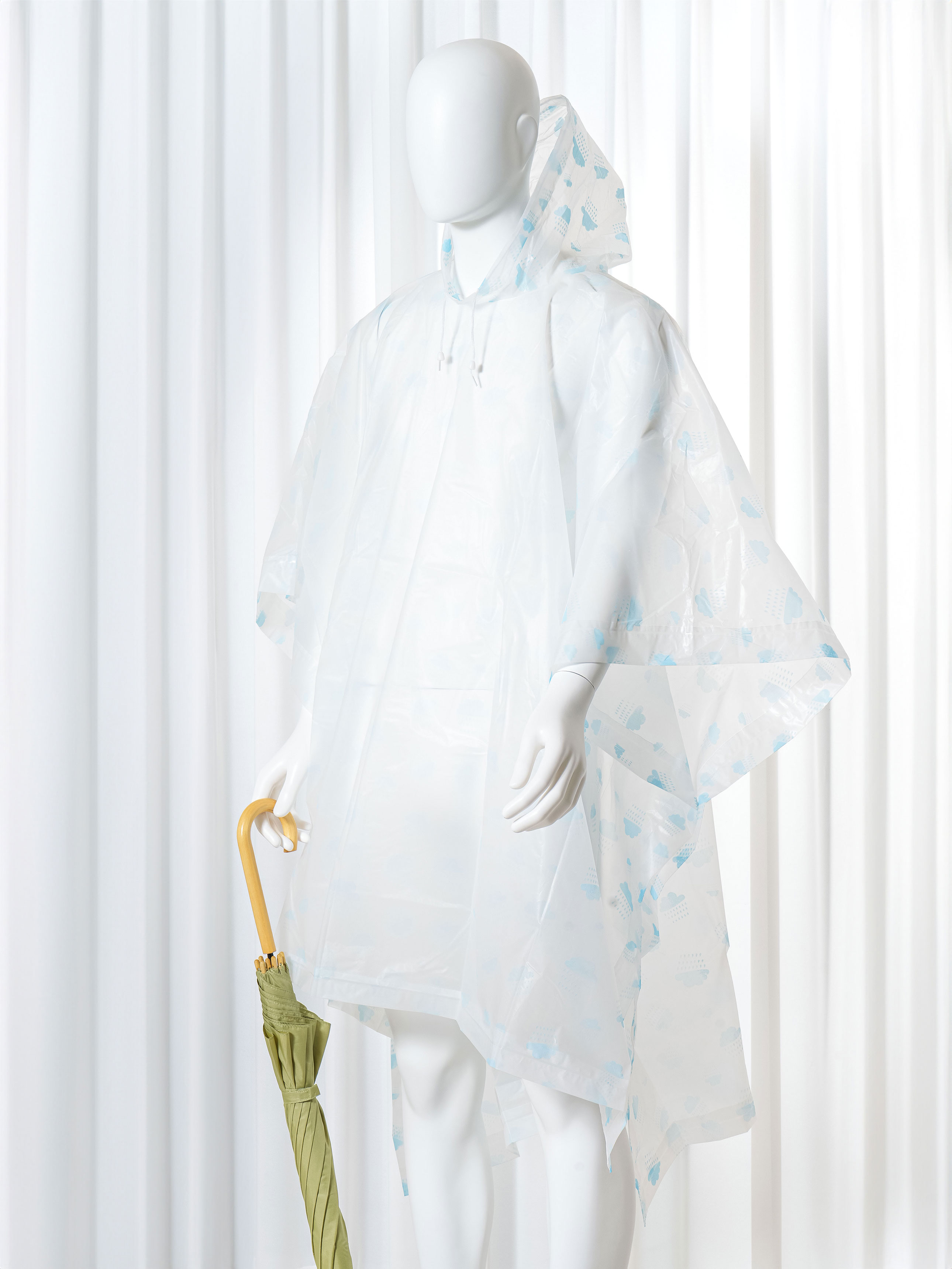 Disposable pattern poncho type raincoat