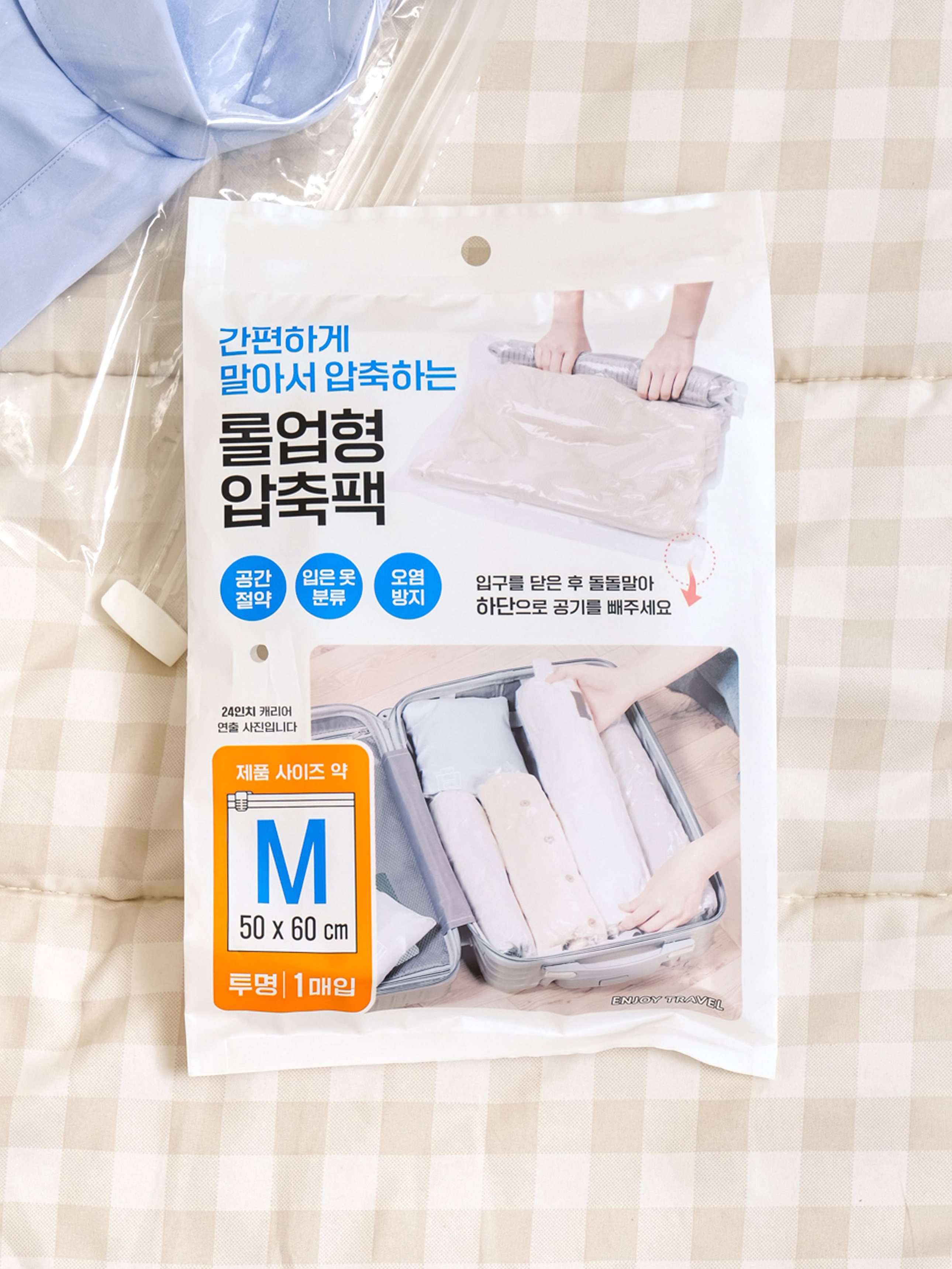 Transparent roll-up compression pack M