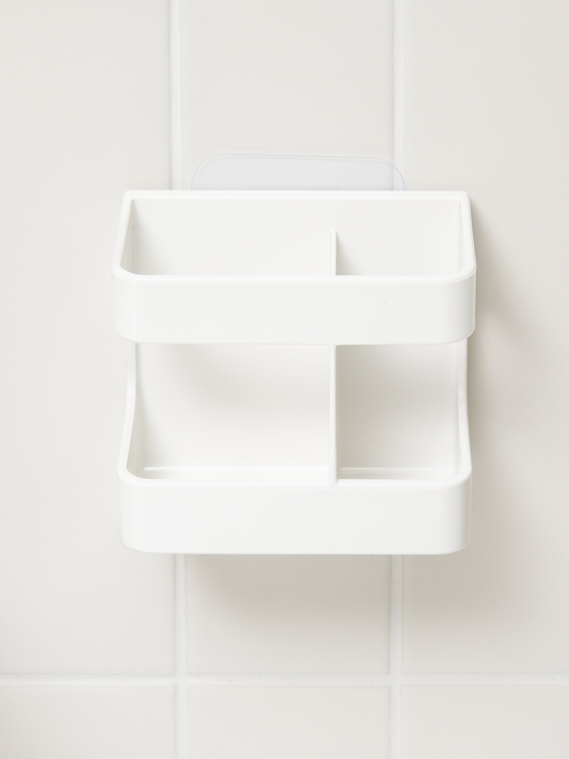 Attachable drainable toothbrush and toothpaste holder