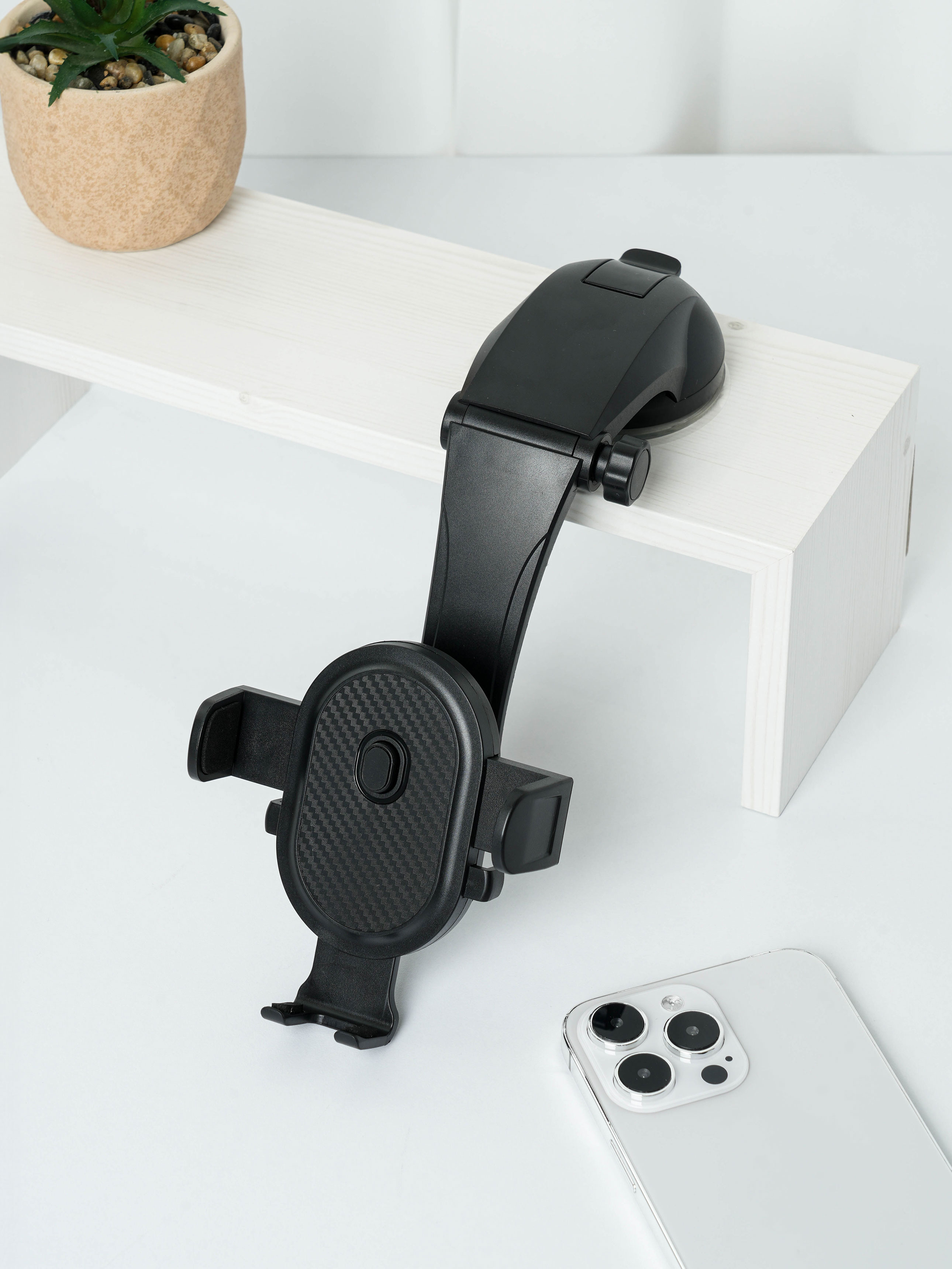 Suction holder for dashboard