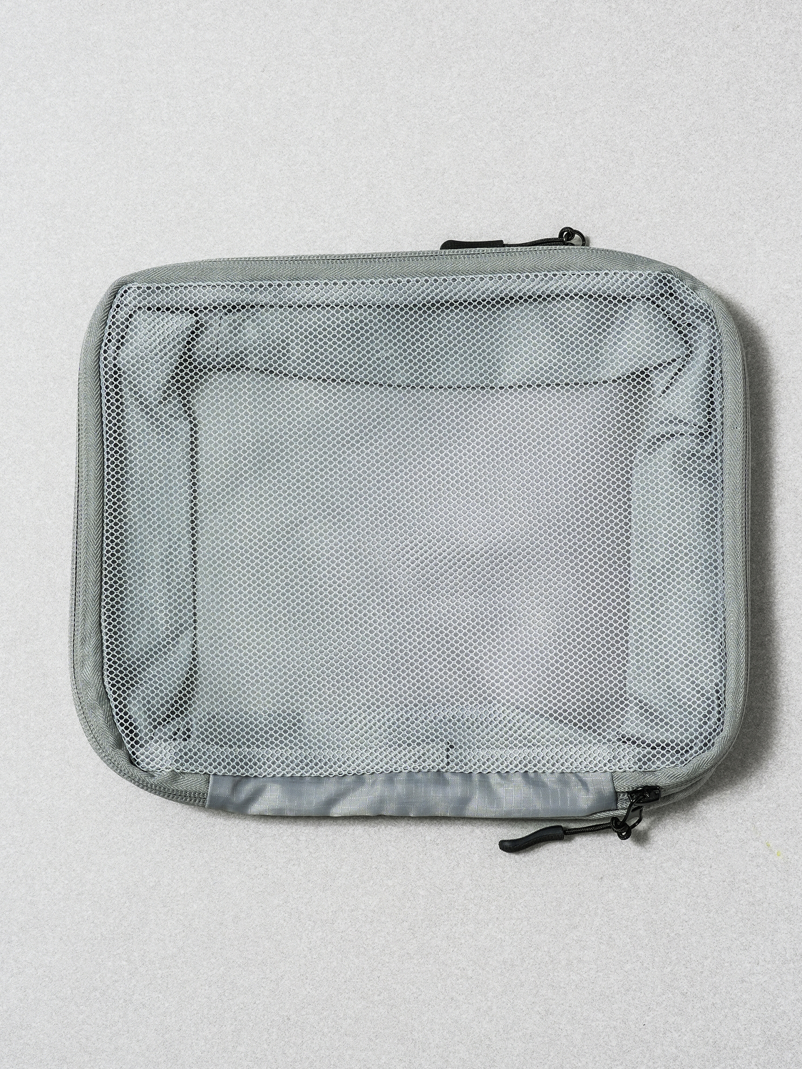 Small travel mesh compression storage pouch