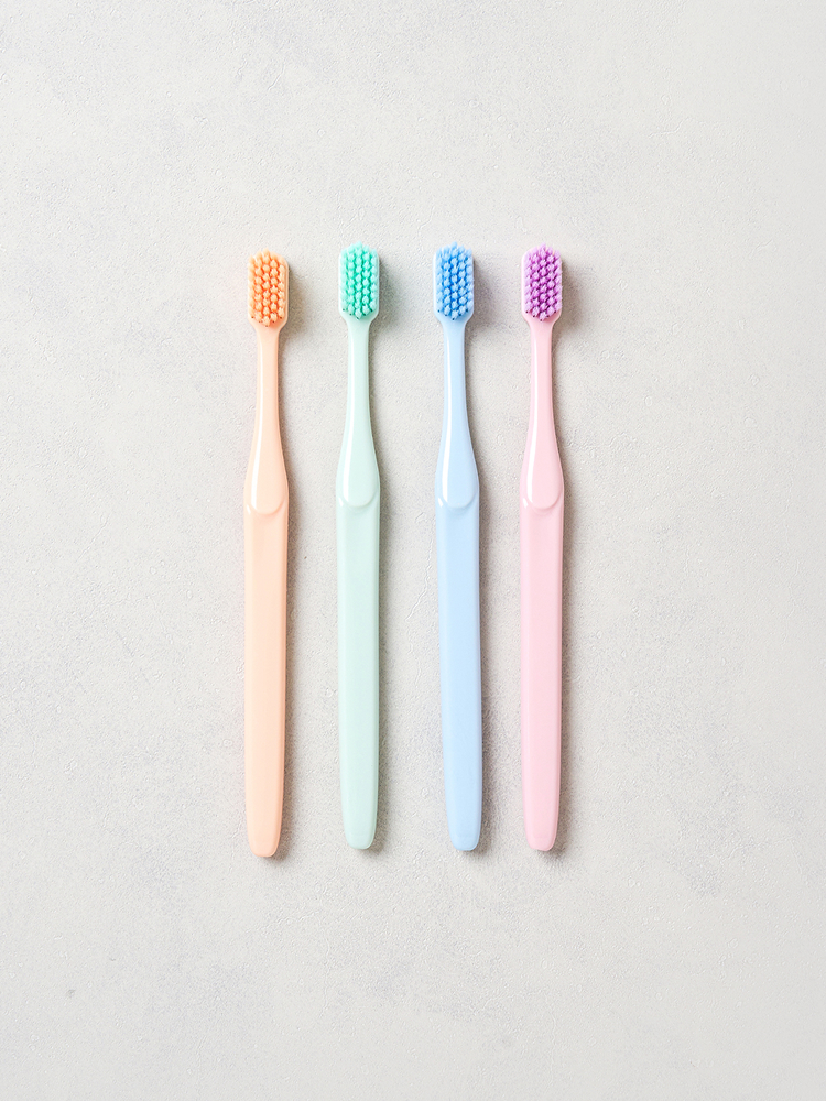 4 colored fine bristle toothbrushes