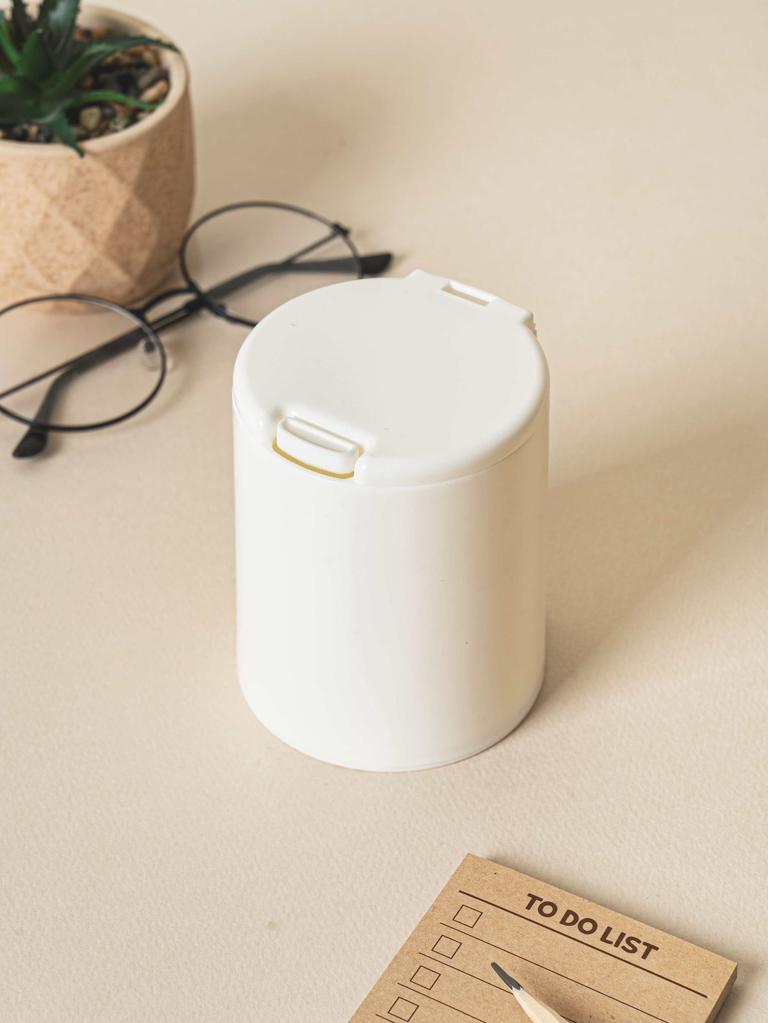One-touch cylindrical multipurpose organizer