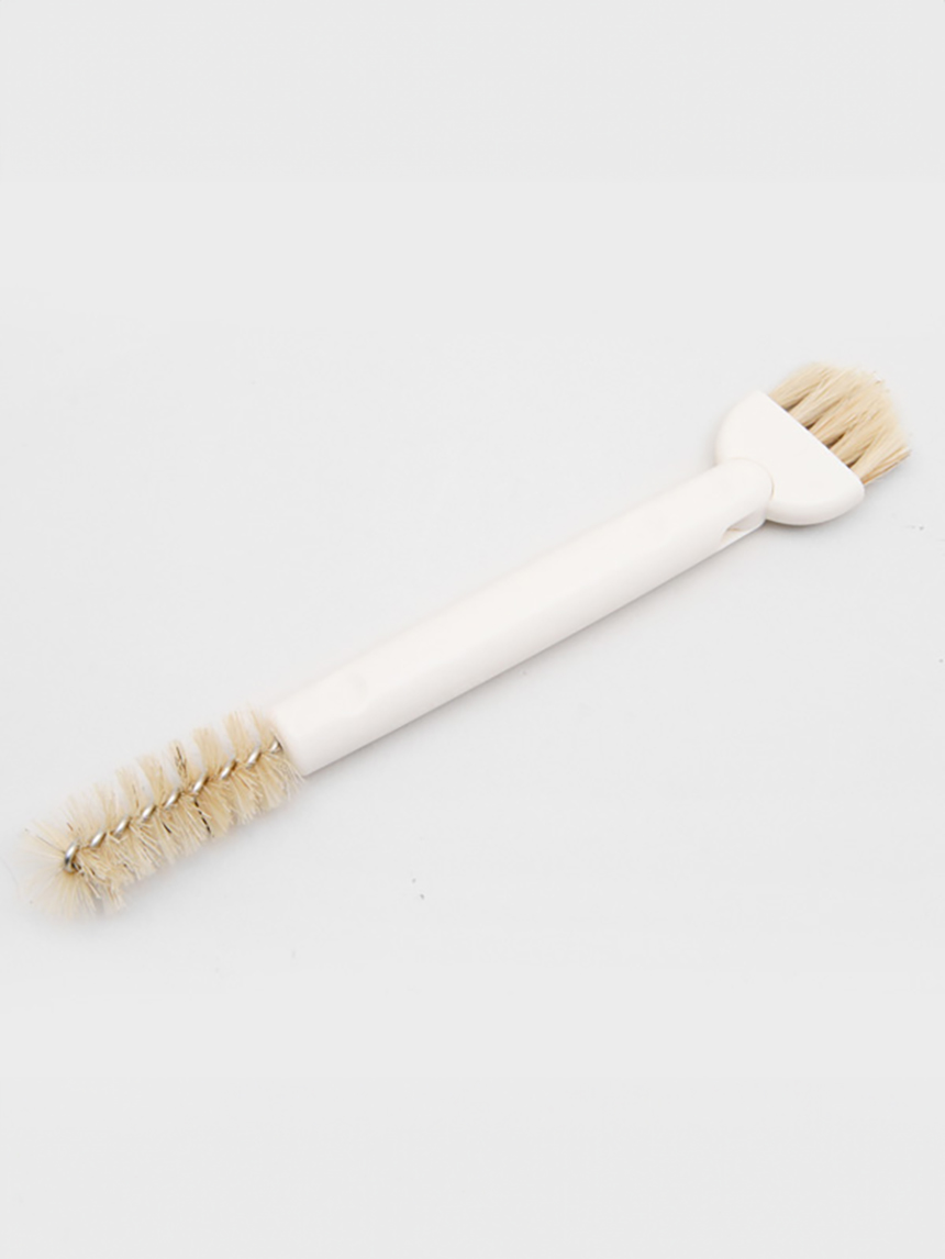 Crevice cleaning pig bristle brush