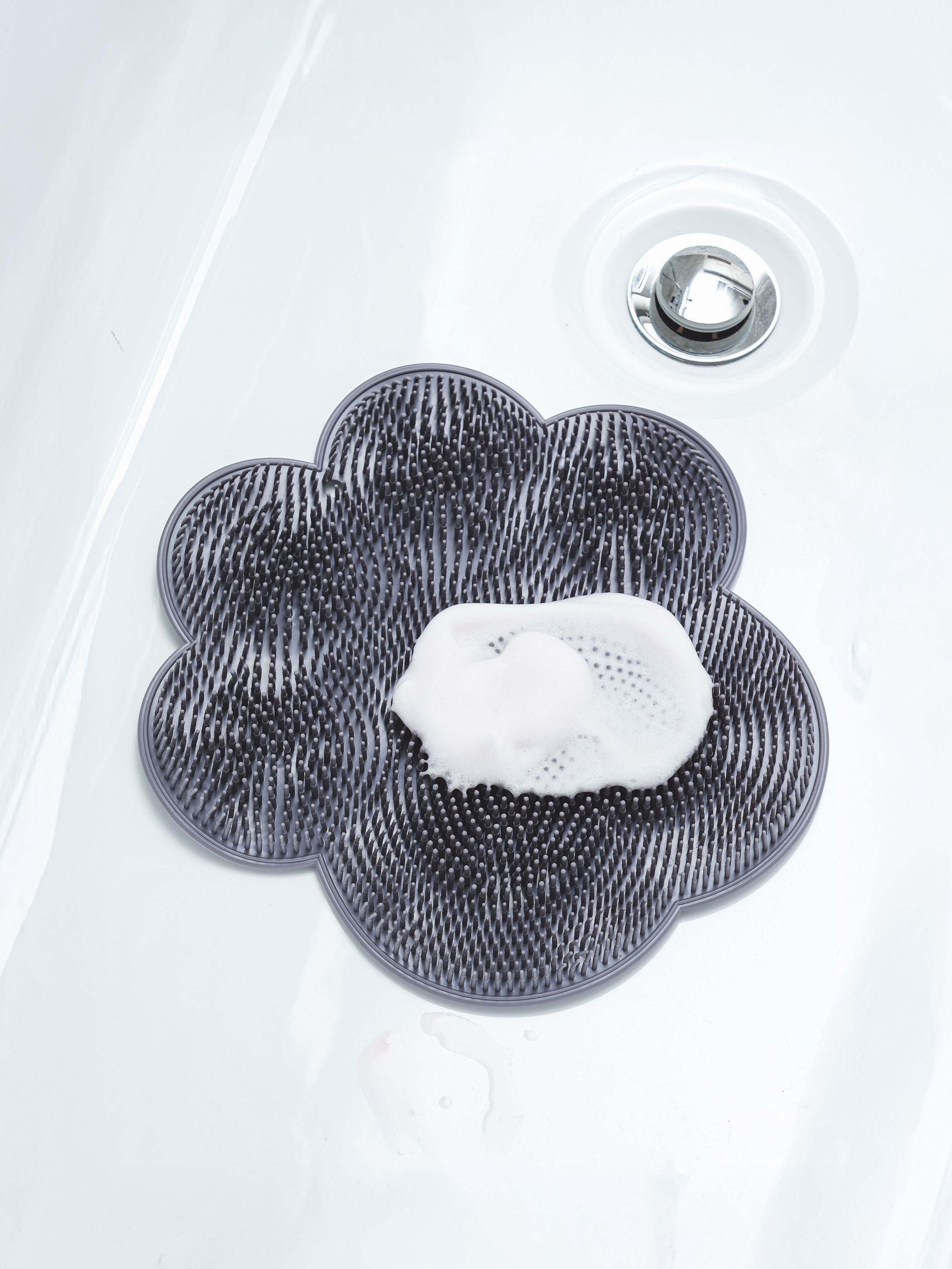 sole shaped foot brush