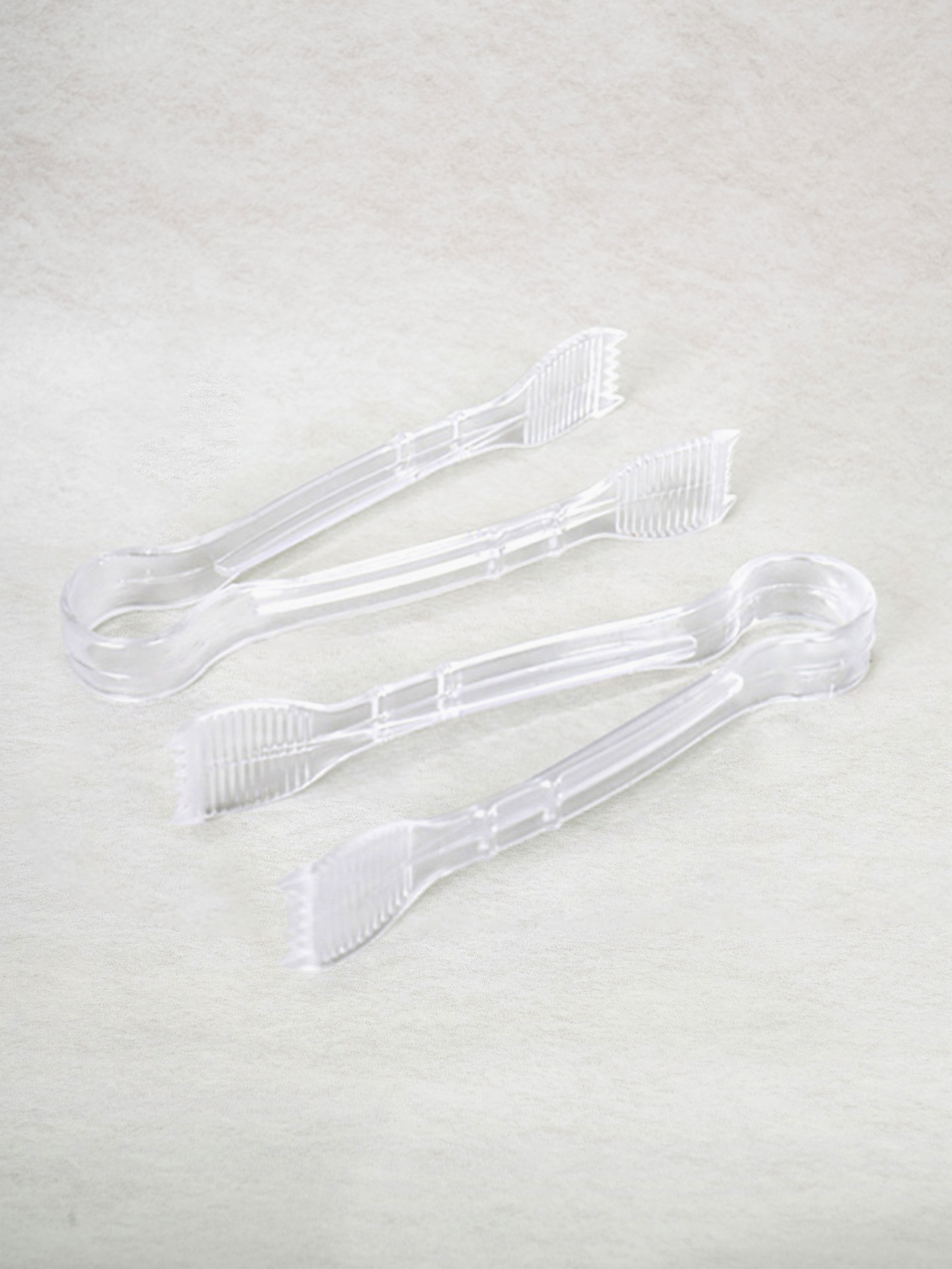 2 multi-purpose tongs included