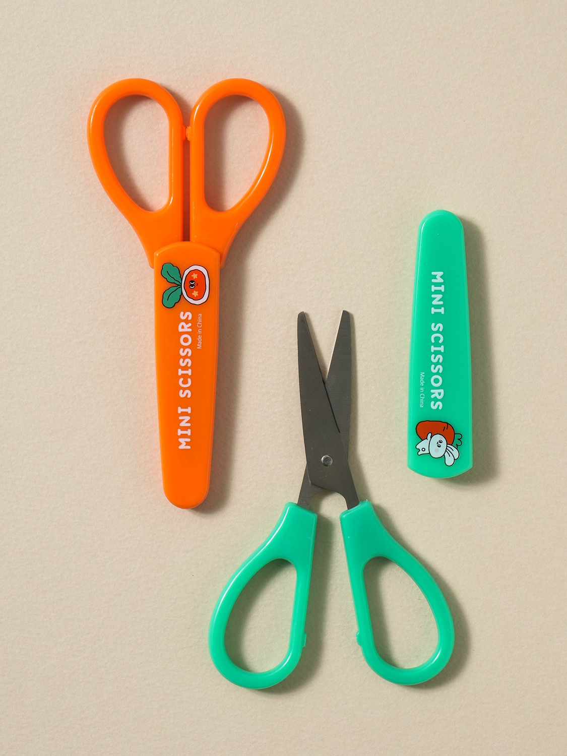 2 character safety cap scissors