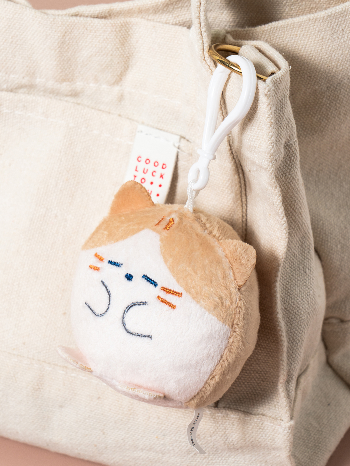 Round cat hanging doll