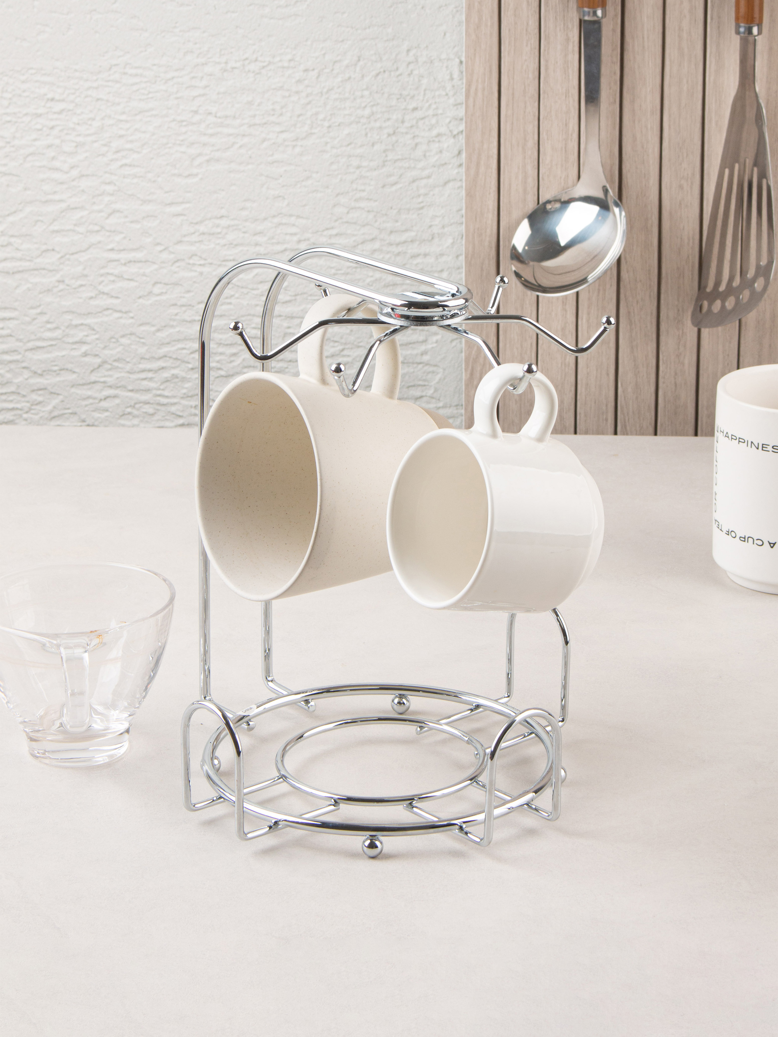 Rotating steel coffee cup holder
