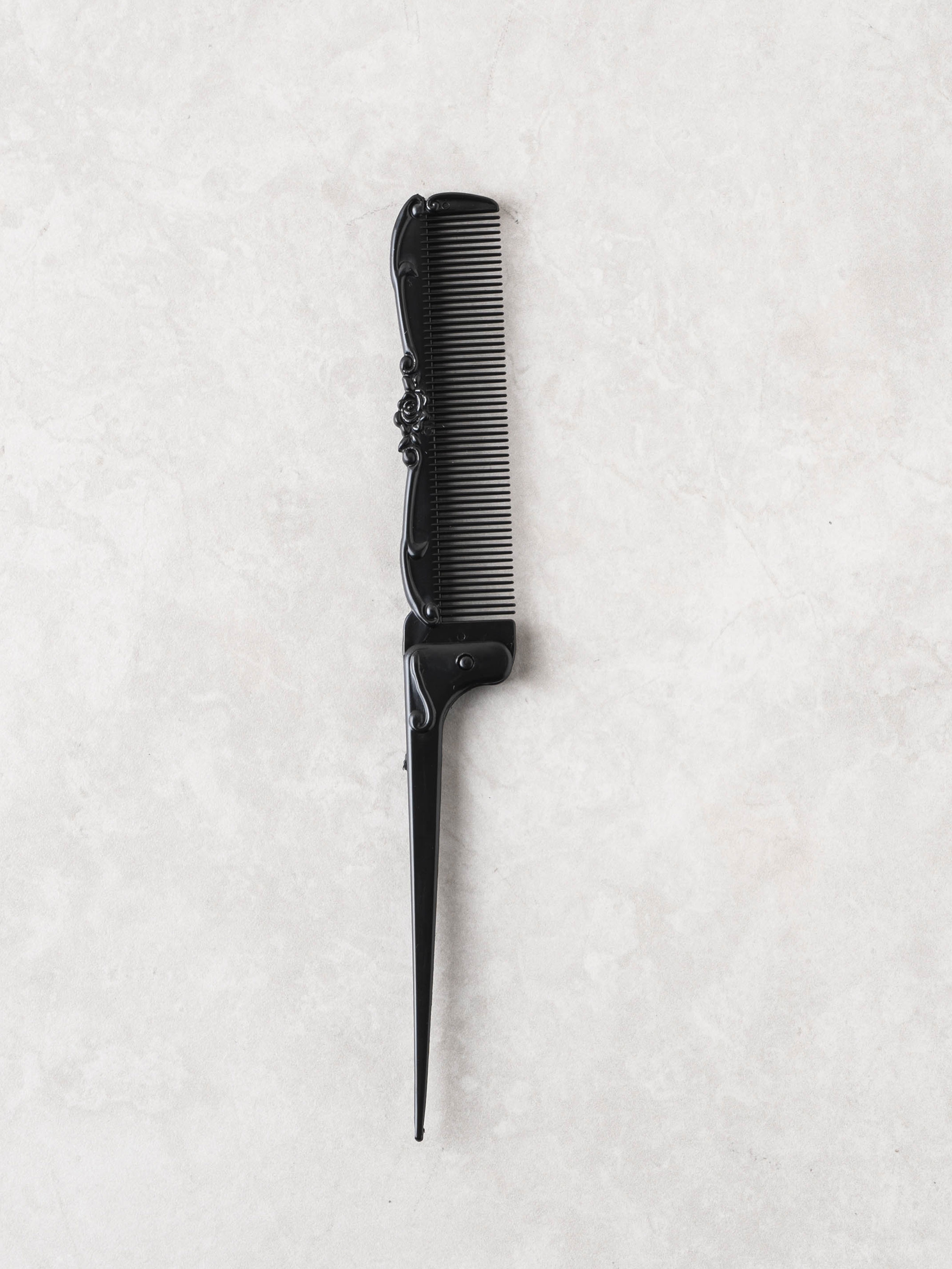 folding tail comb