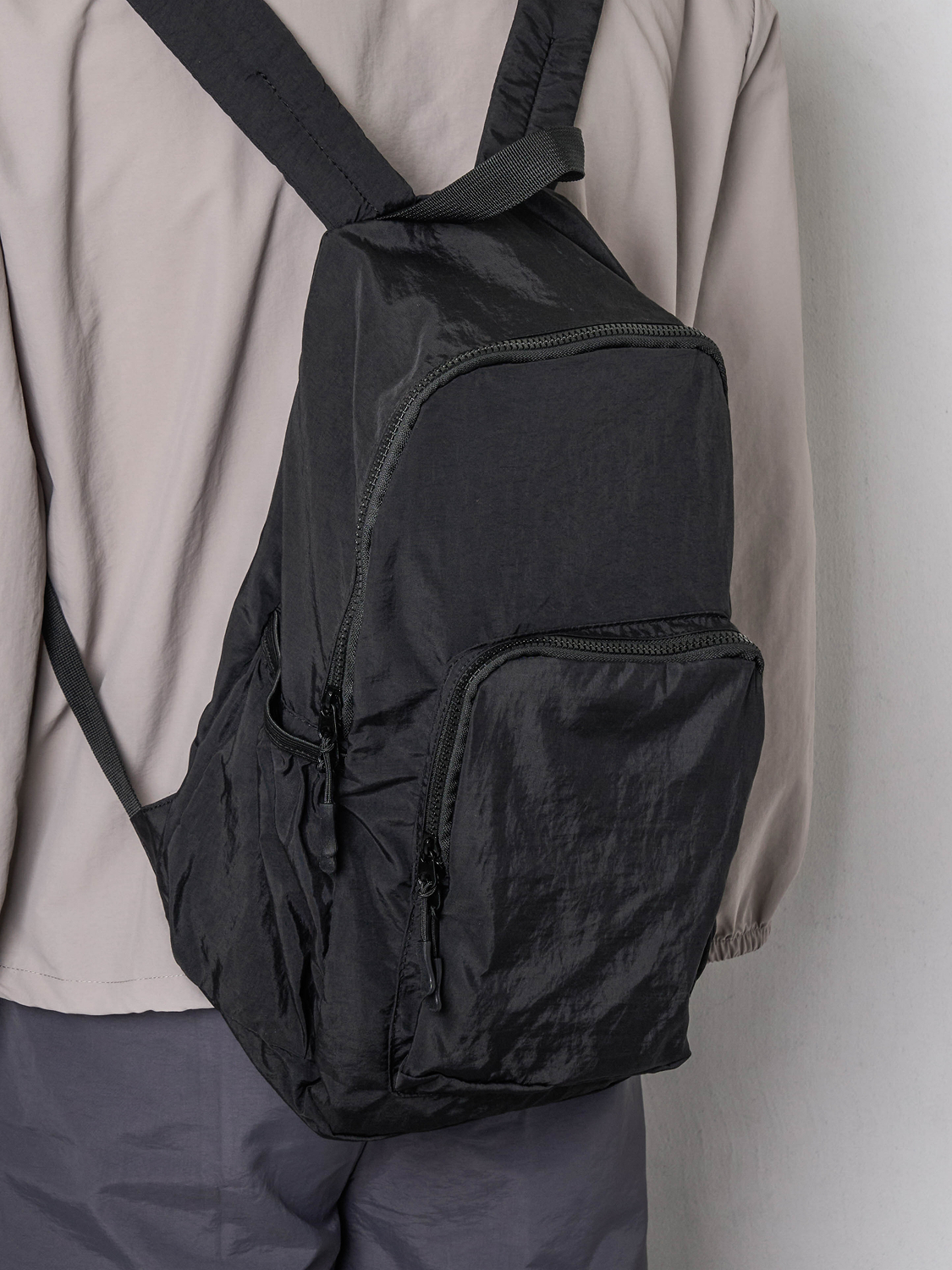 Nylon lightweight front pocket backpack black