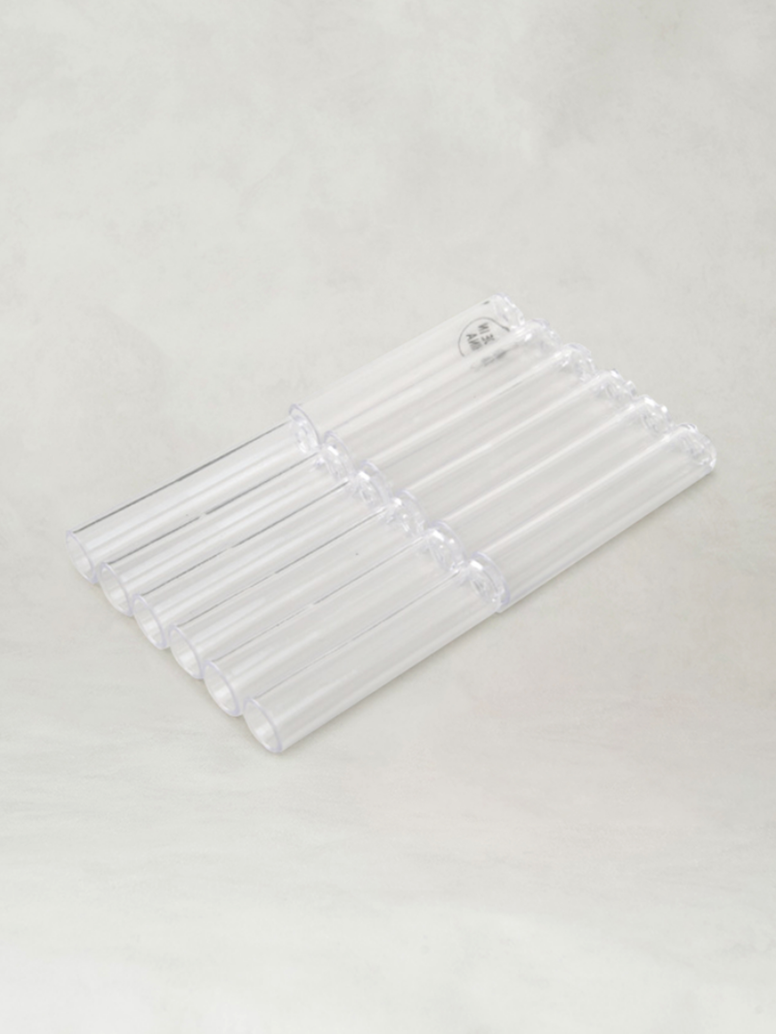 12 transparent pencil caps