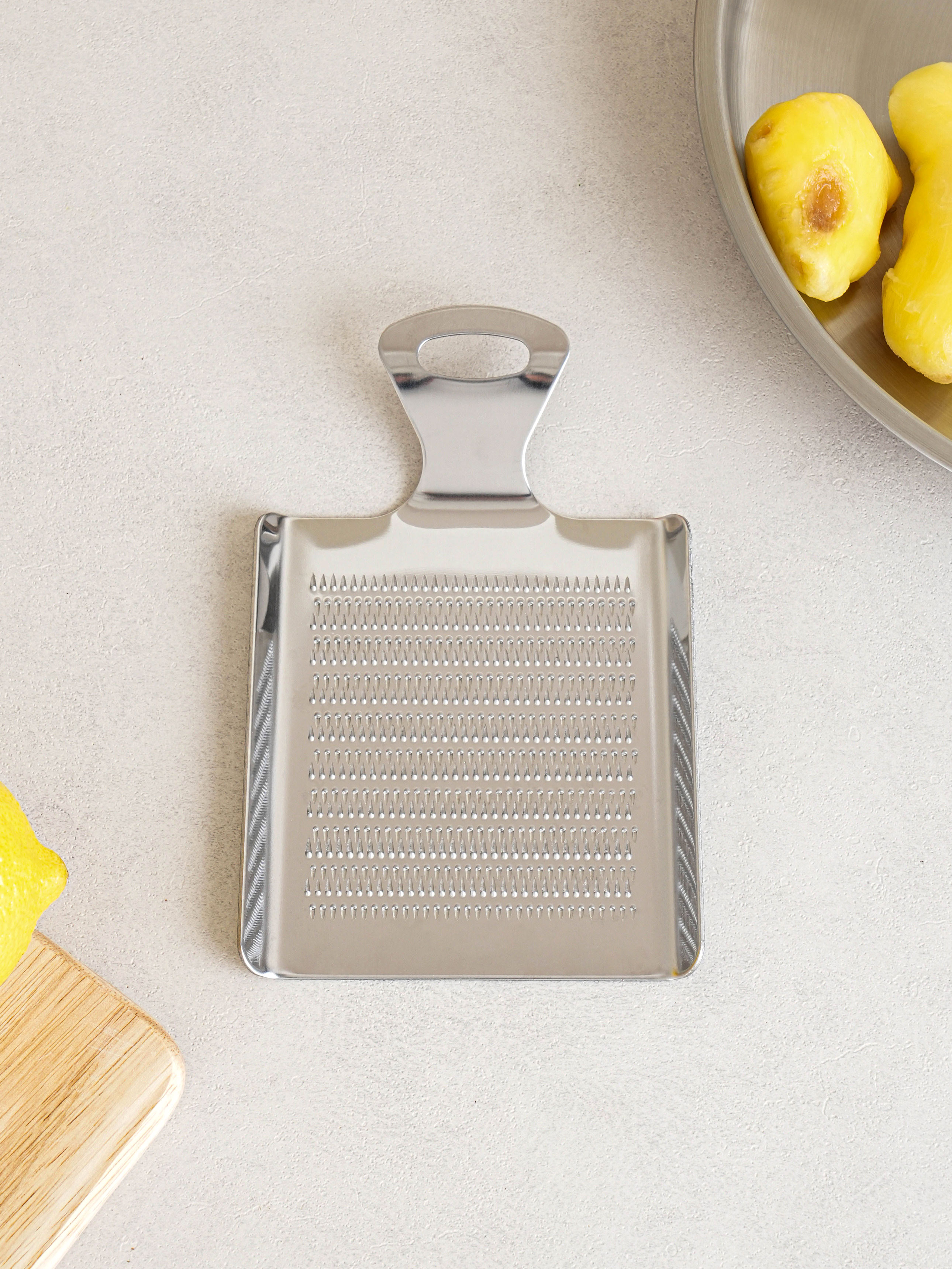 Multipurpose stainless steel mini grater