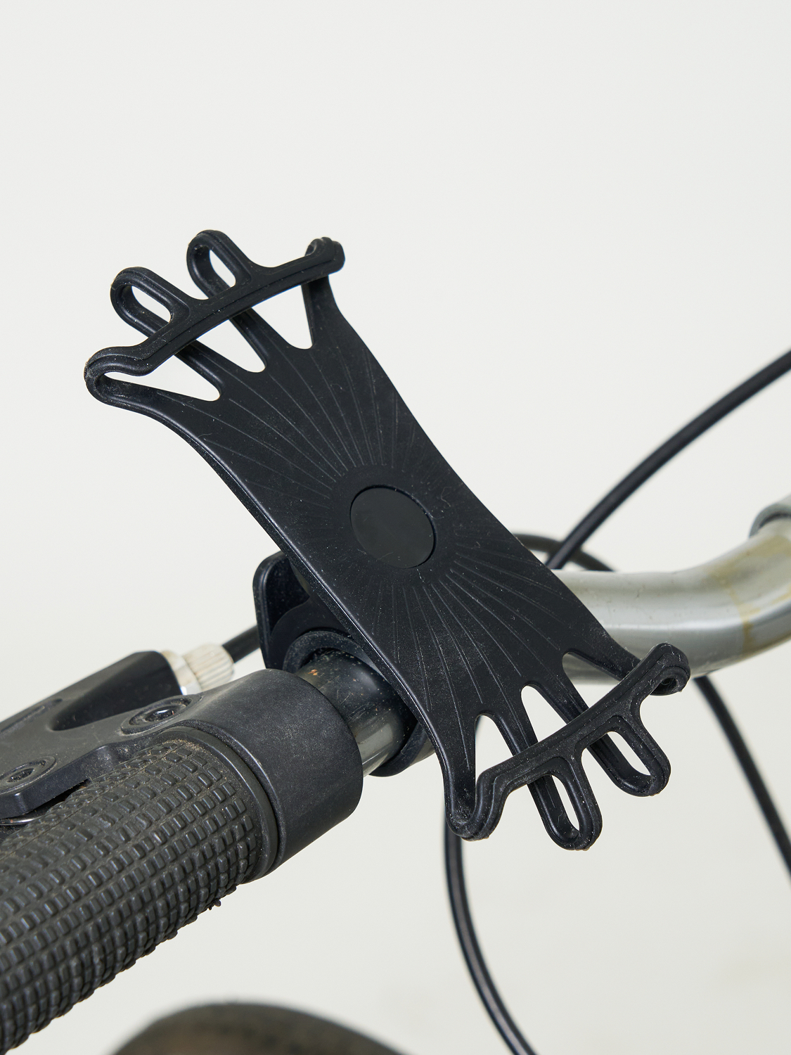 Rotating silicone cell phone holder for bicycle