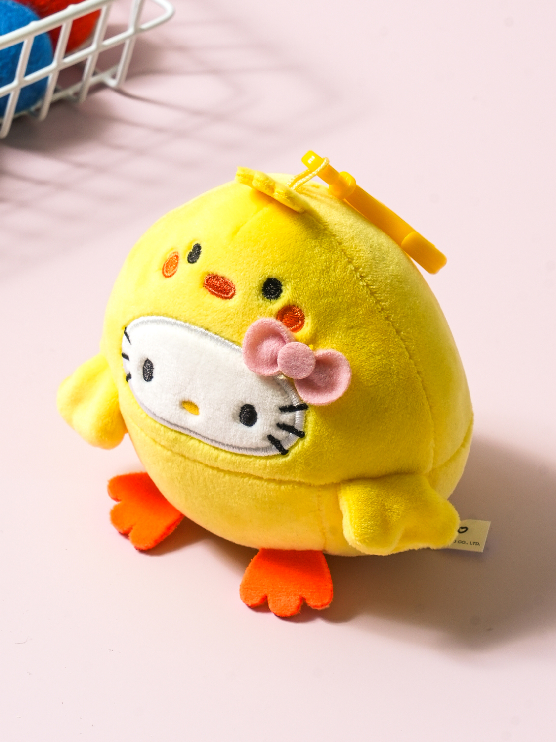 Hello Kitty hanging doll wearing animal mask yellow