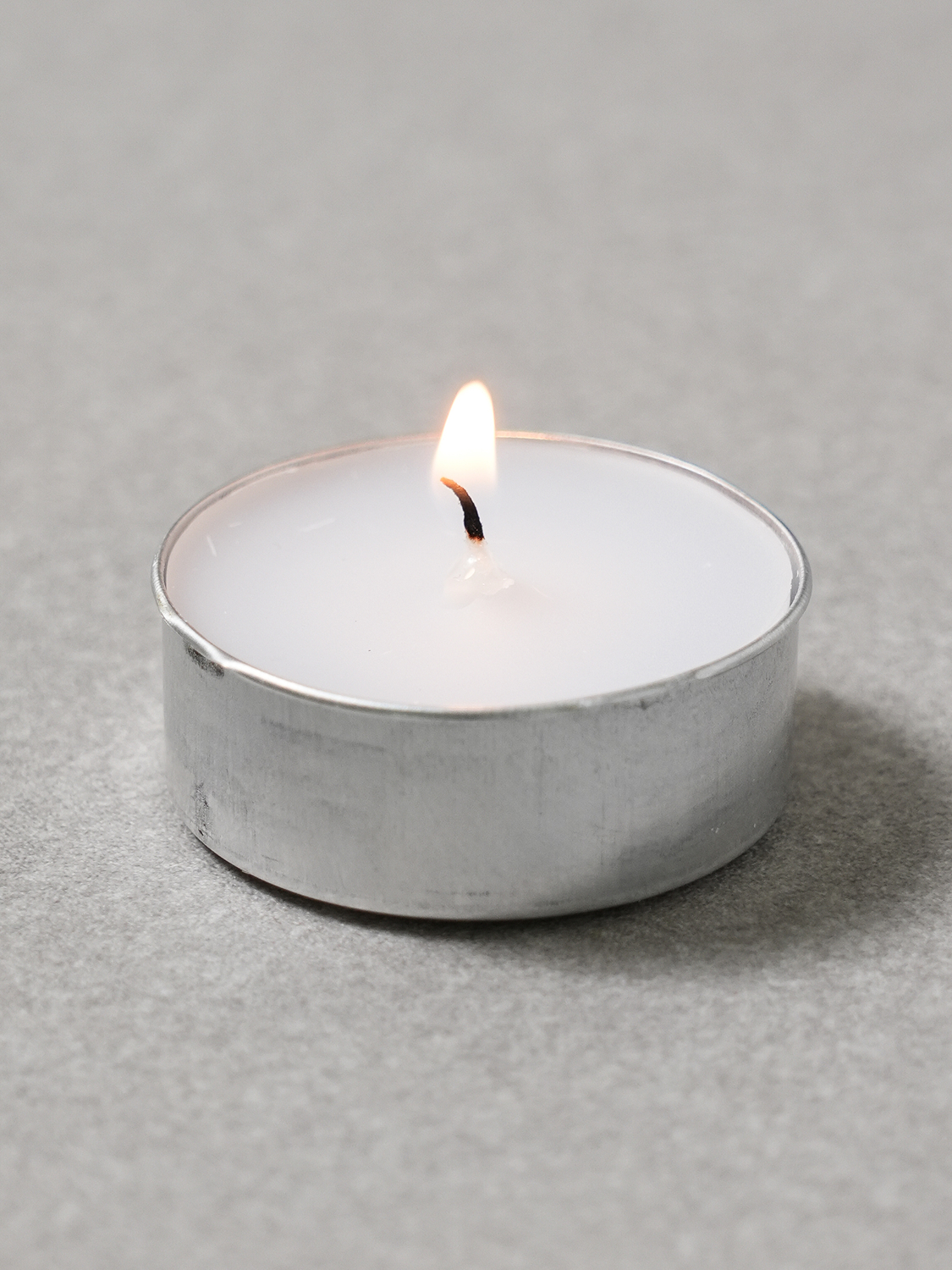Colored tea candle cotton blossom scent 12 g 40 pieces
