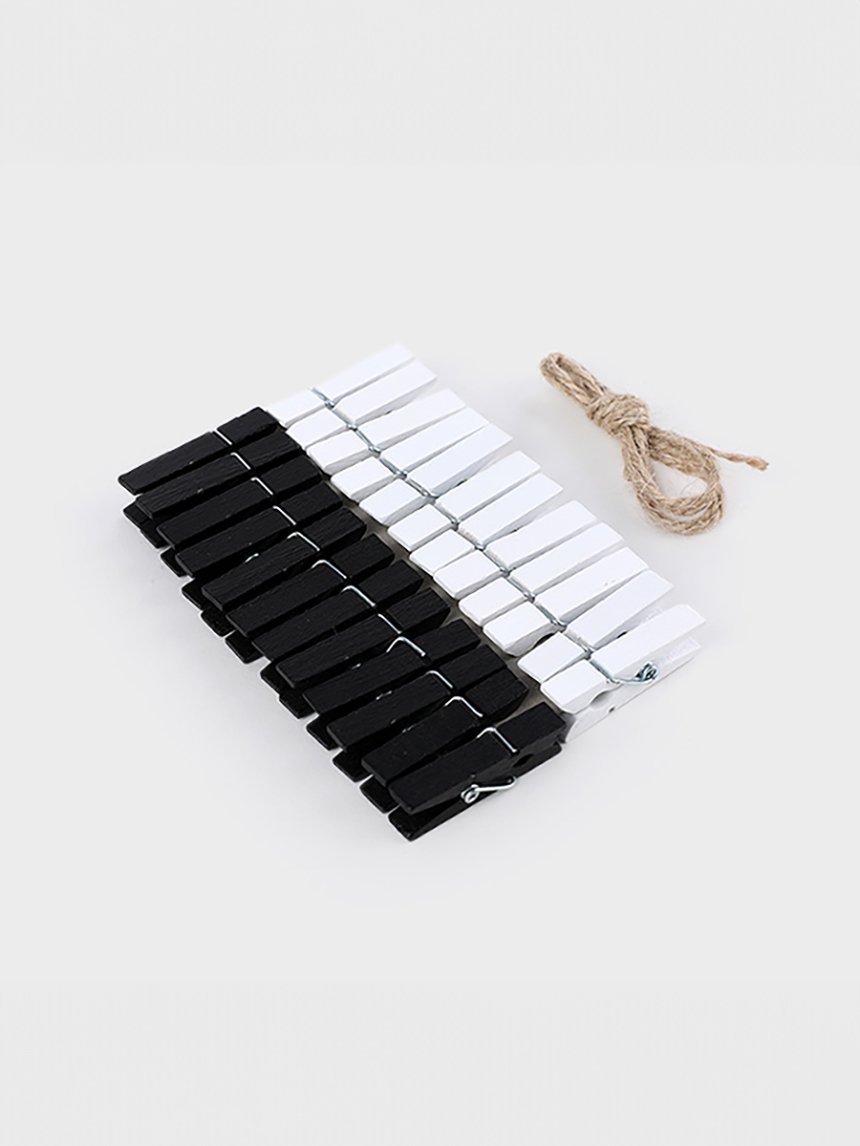 24 black & white wooden tongs
