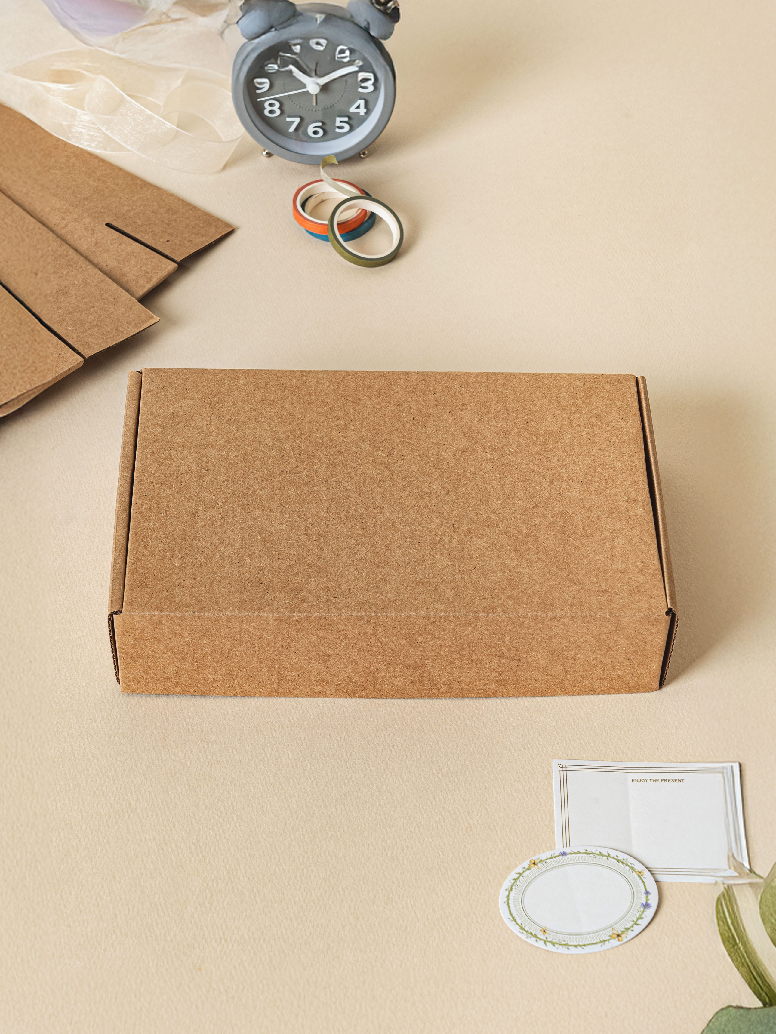 3 medium-sized kraft packaging boxes