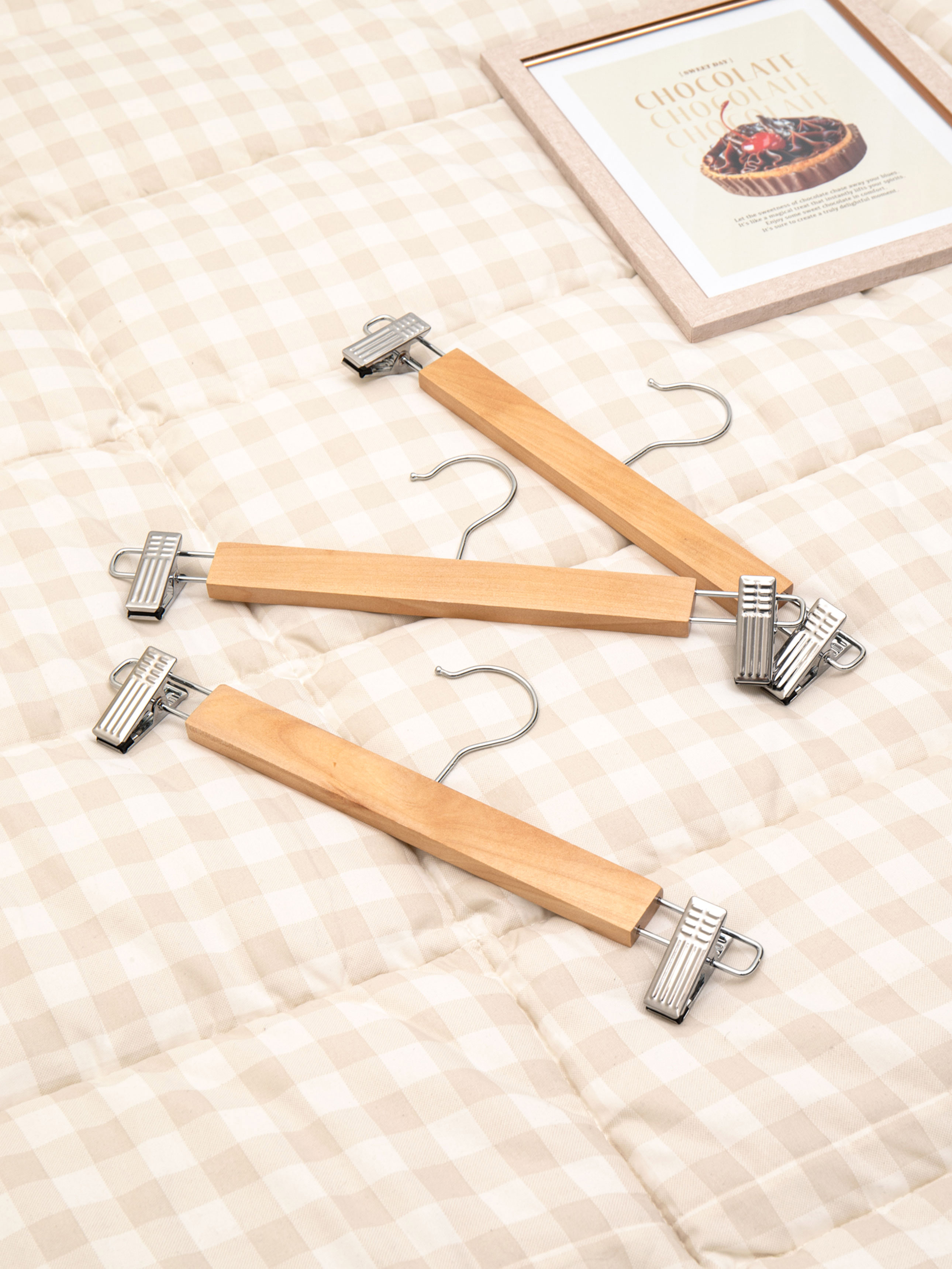 3 wooden clip-type trouser hangers