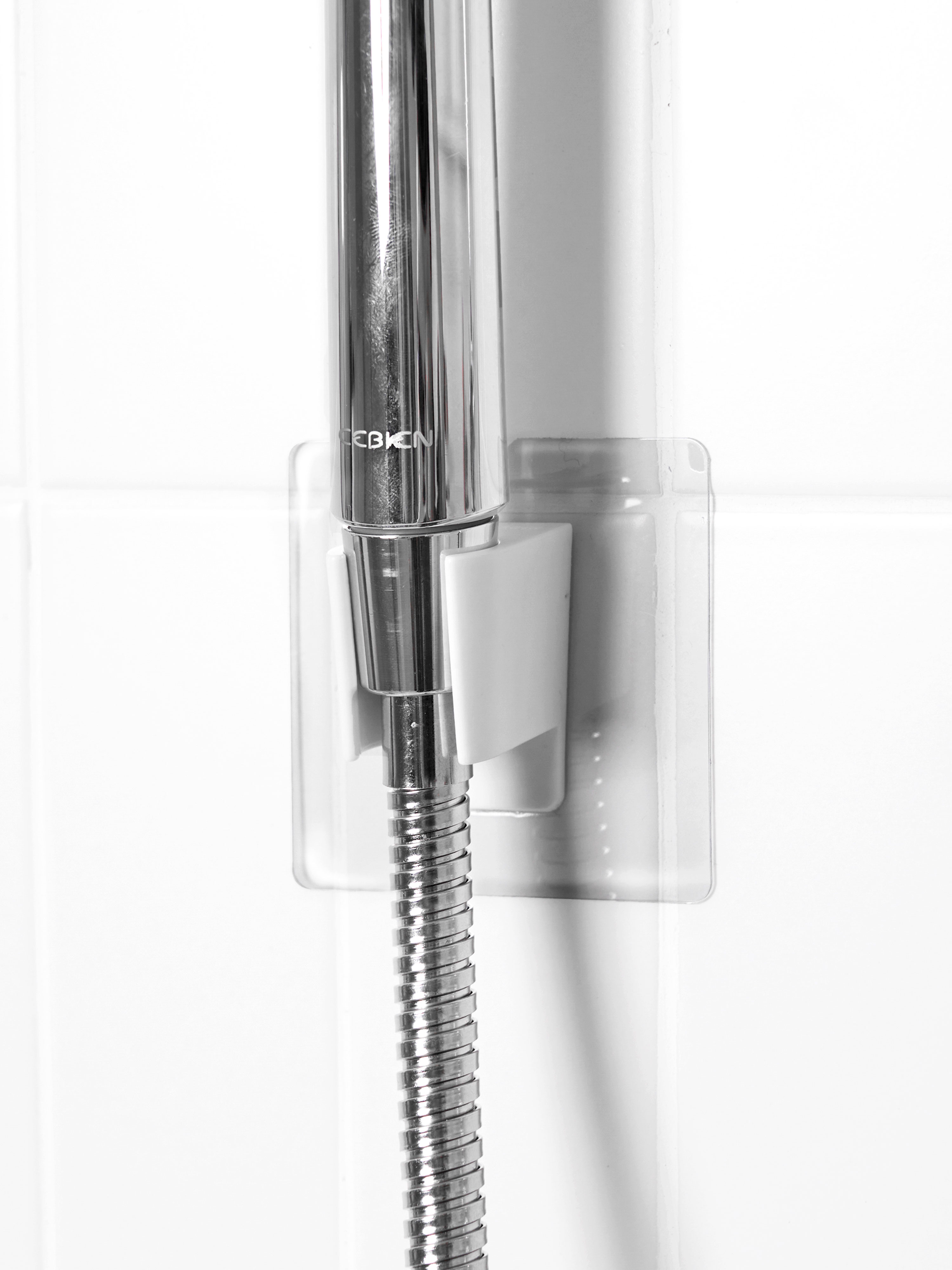Adhesive shower hanger