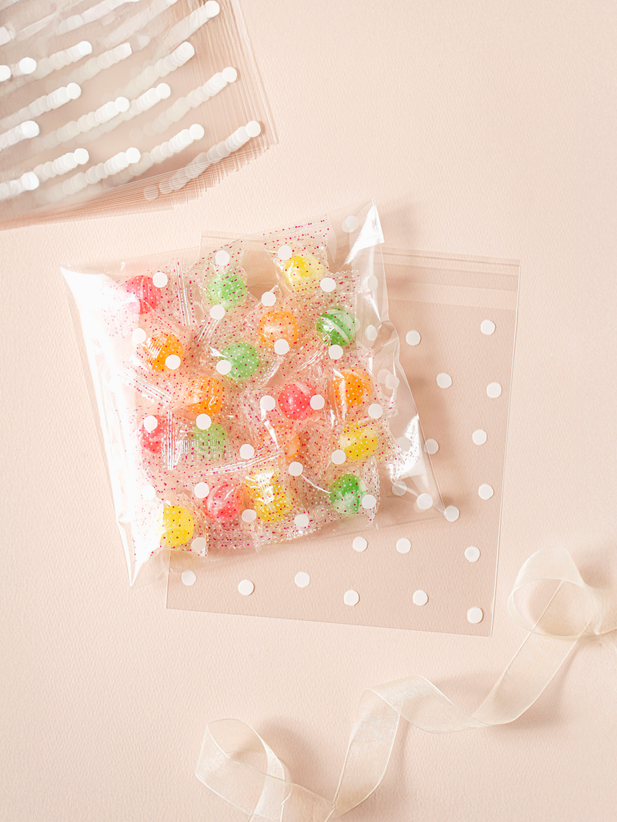 Adhesive packaging bags 18