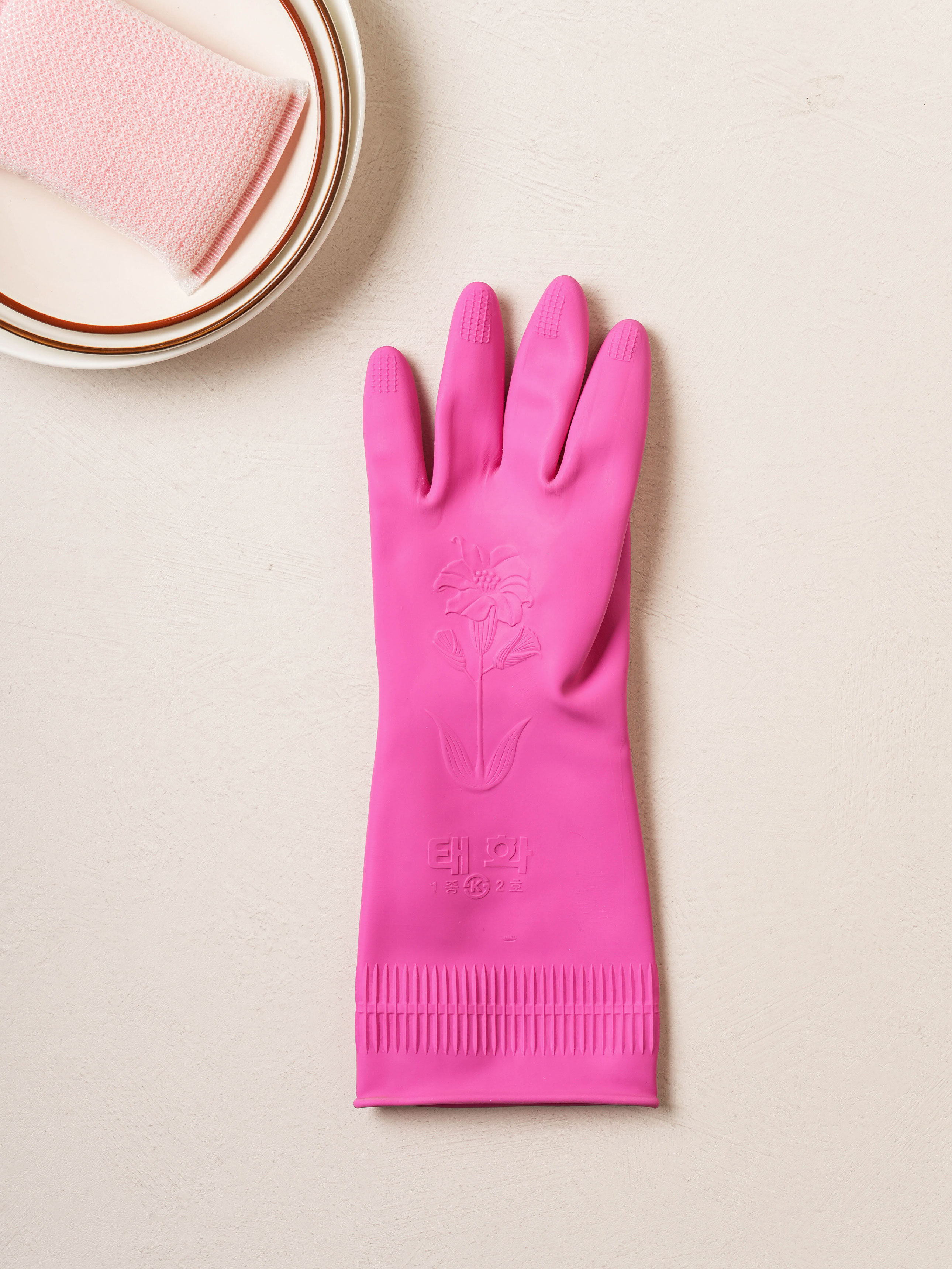 One-handed rubber glove left medium size